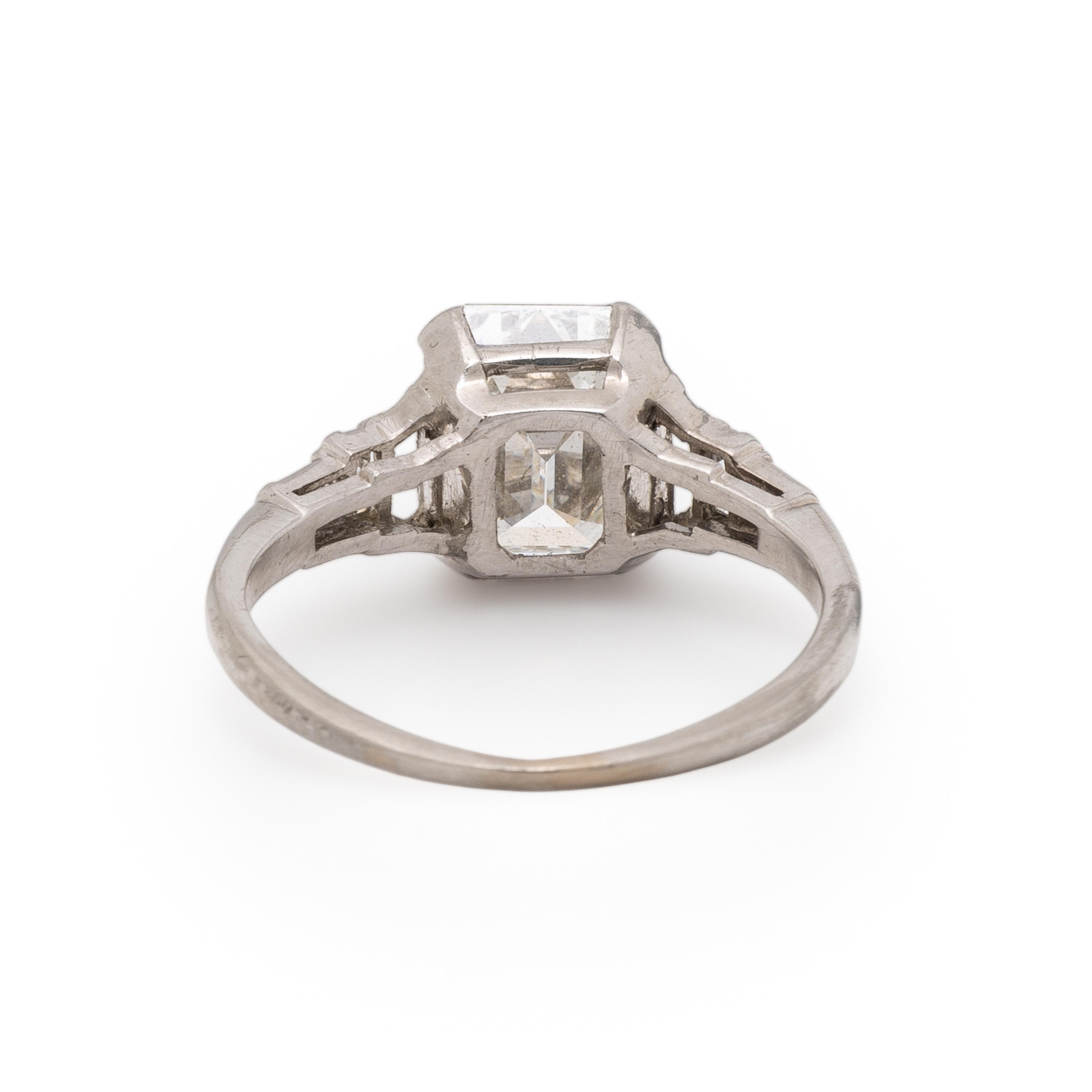 EMERALD CUT DIAMOND AND PLATINUM RING