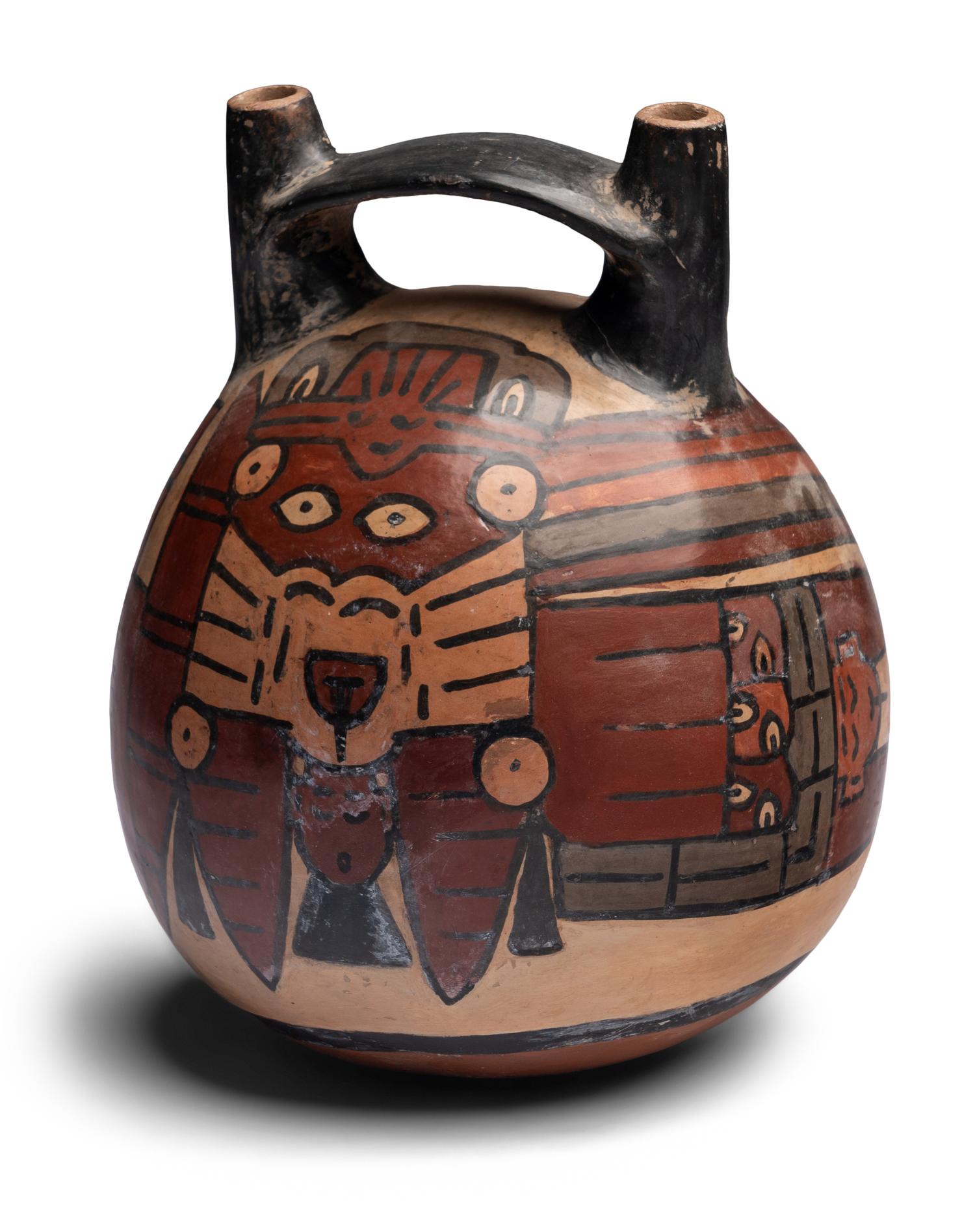 A Nazca Style Polychrome Stirrup Vessel