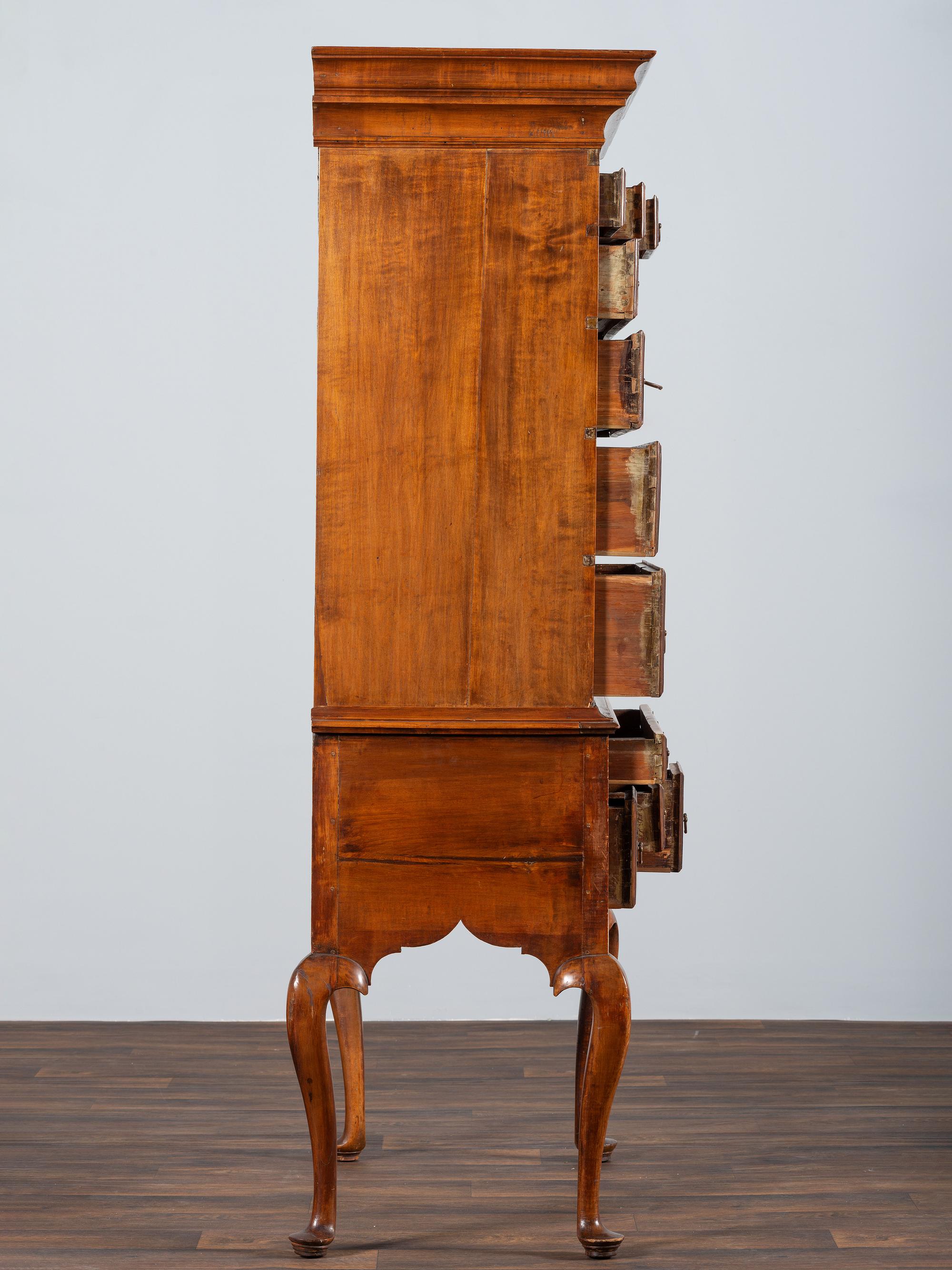 A Queen Anne Shell-Carved and Figured Maple Flat-Top High Chest of Drawers