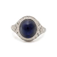 ART DECO, CABOCHON SAPPHIRE AND DIAMOND RING