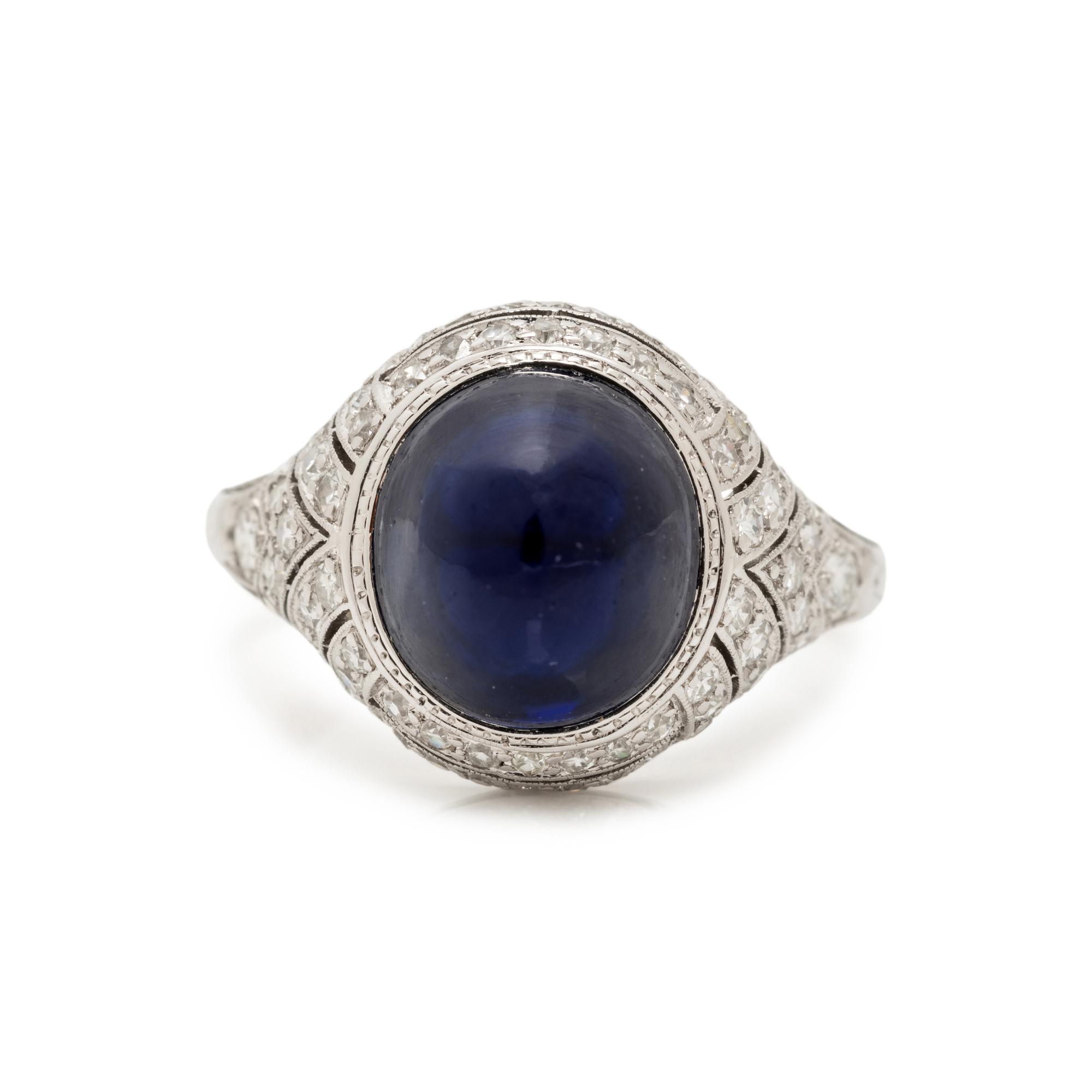 ART DECO, CABOCHON SAPPHIRE AND DIAMOND RING