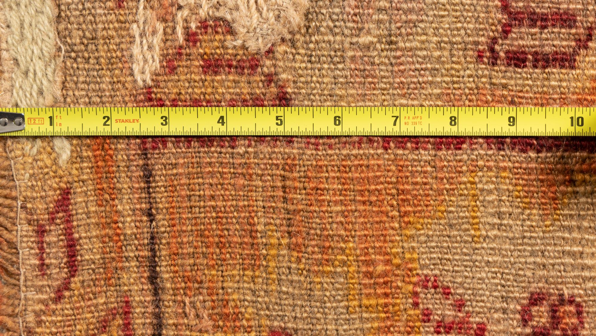 An Oushak Wool Rug