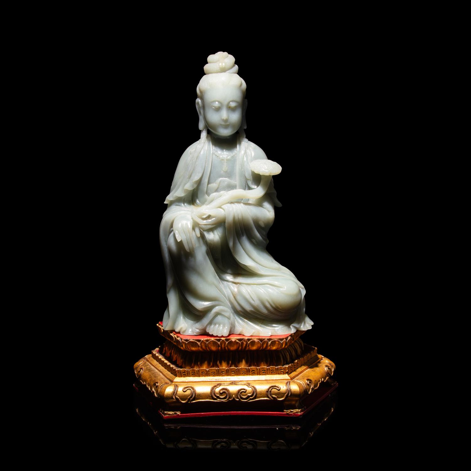 A Chinese Celadon Jade Seated Guanyin, 20th Century — 近代 青玉觀音坐像