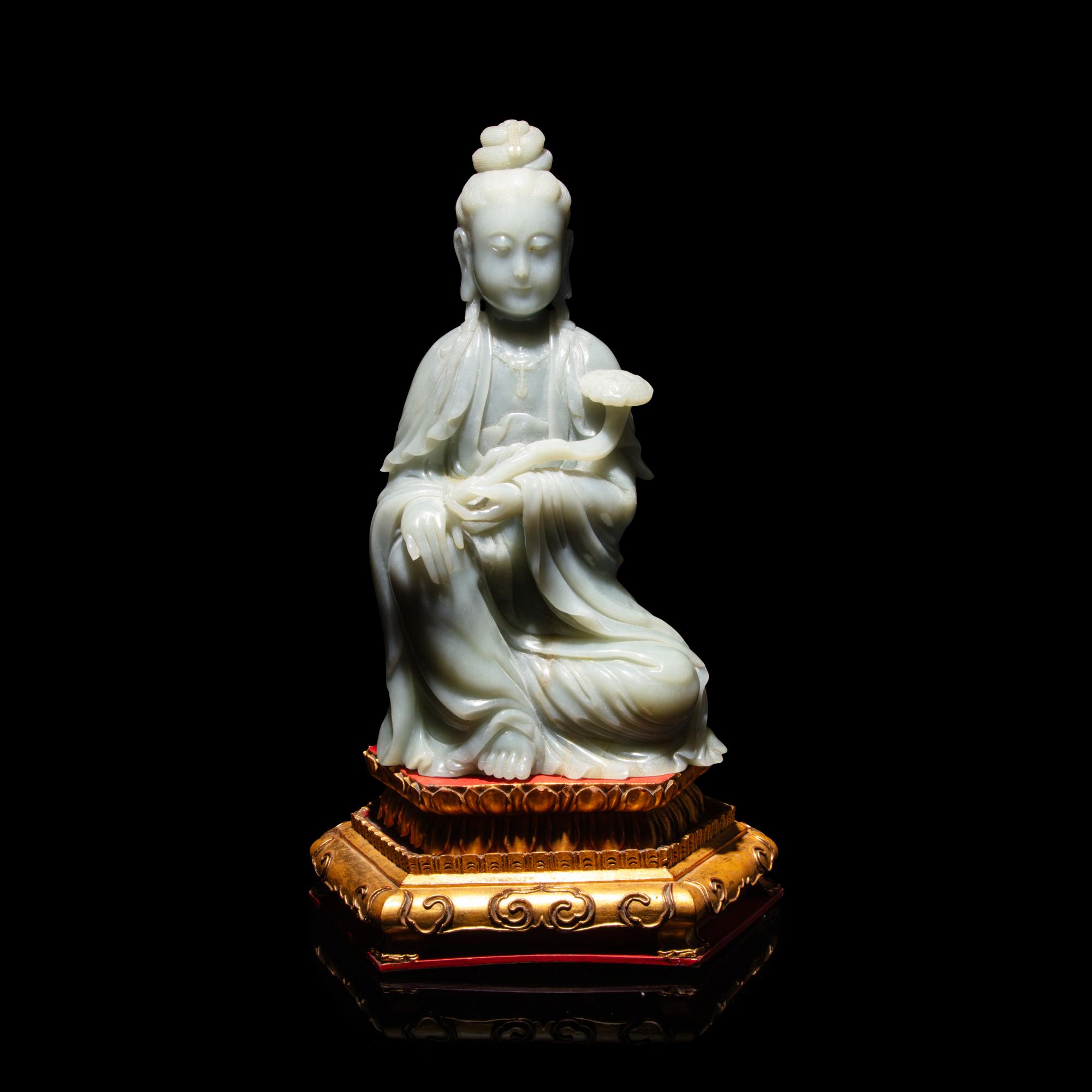 A Chinese Celadon Jade Seated Guanyin, 20th Century — 近代 青玉觀音坐像