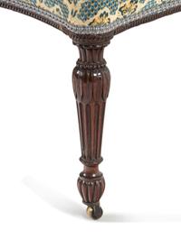 A George III Carved Mahogany Settee
