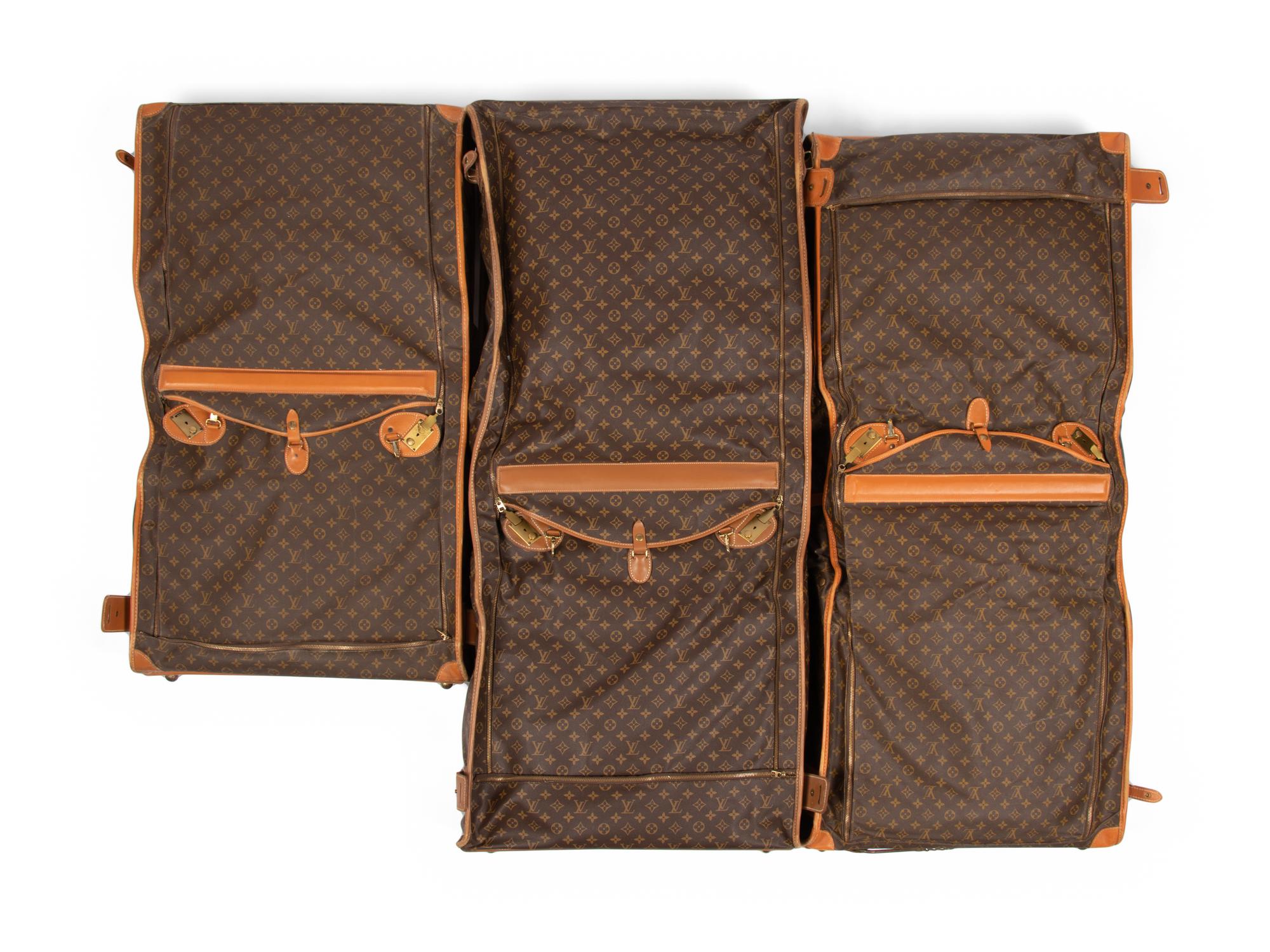 Four Louis Vuitton French Company Garment Bags, 1976-91