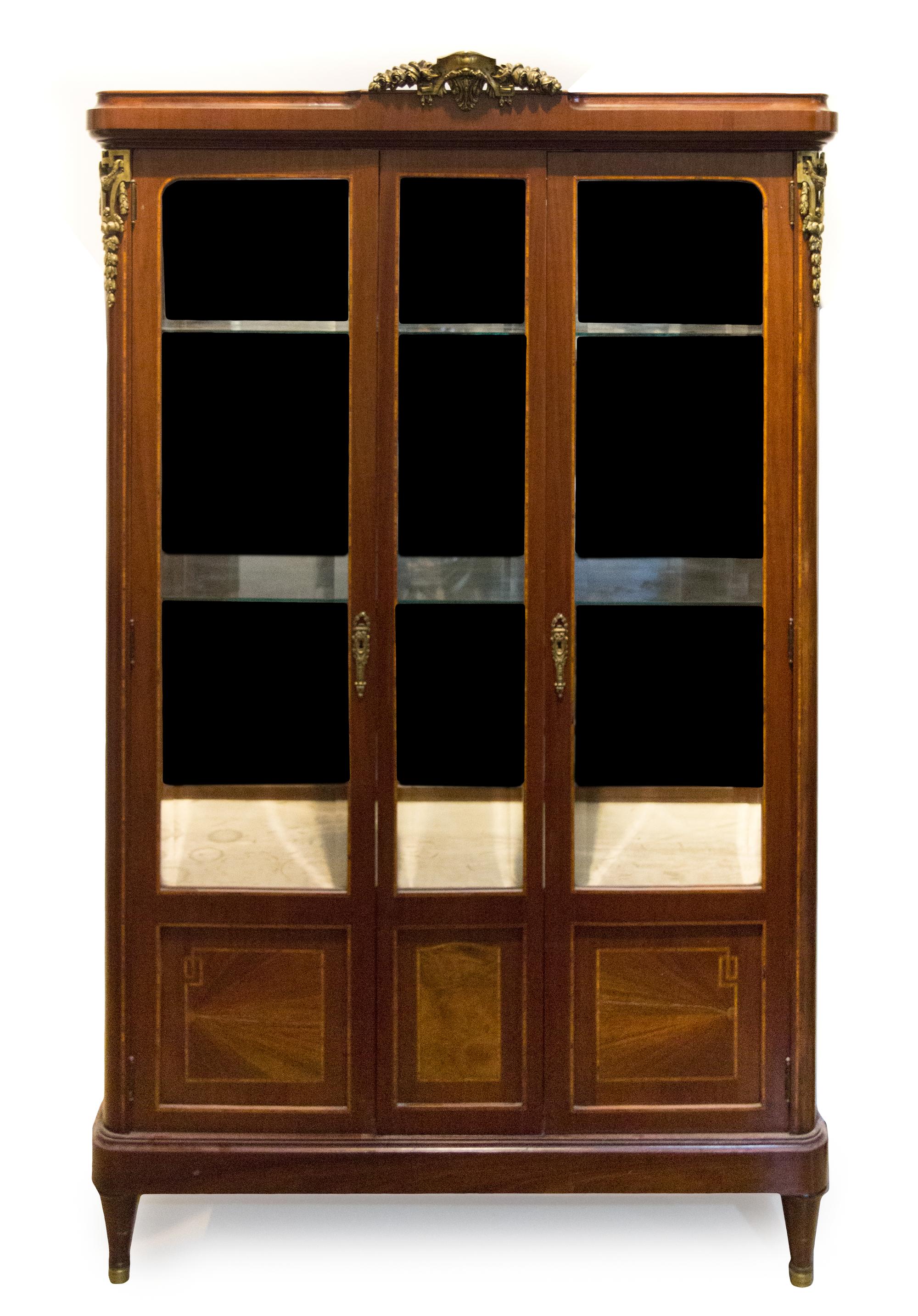 A Louis XVI Style Gilt Bronze Mounted Mahogany Vitrine Height 72 x width 43 1/2 x depth 17 inches. — EARLY 20TH CENTURY