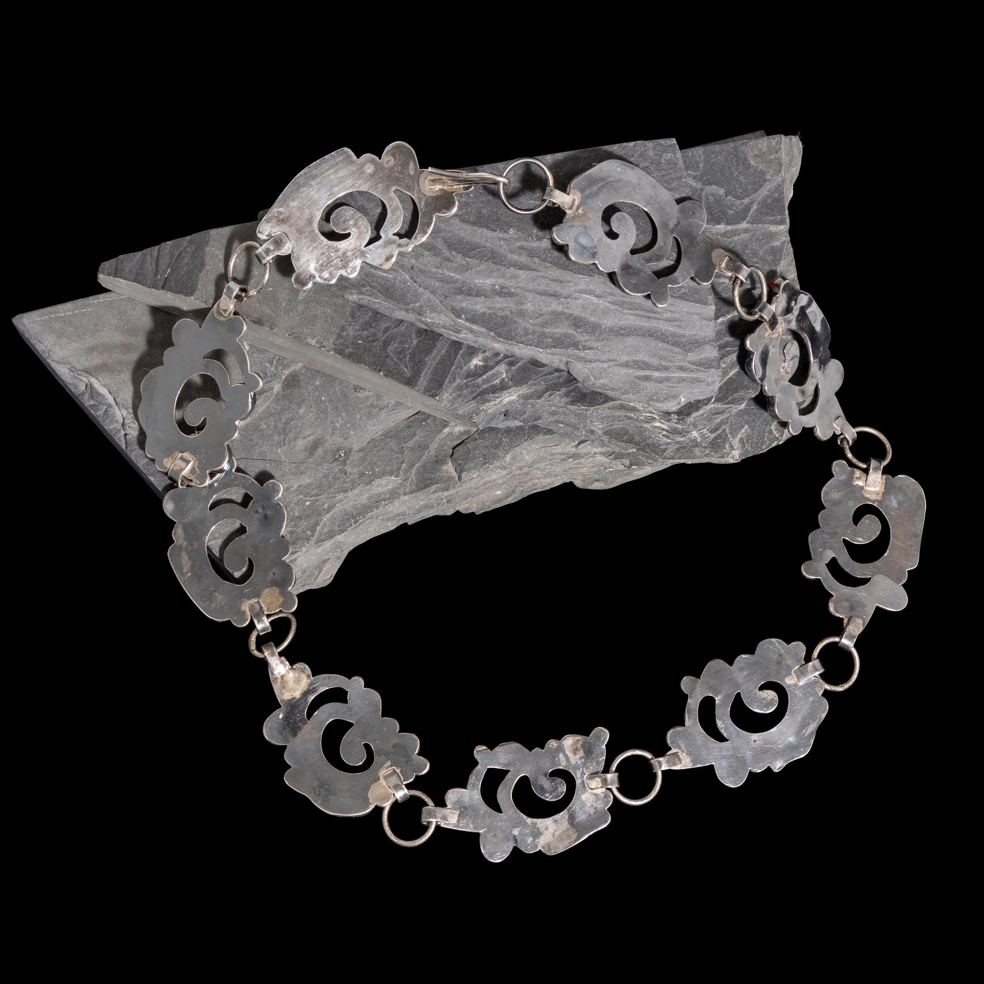 Dan Simplicio, Attributed (Zuni, 1917-1969) — Silver, Turquoise, and Coral Link Concha Belt