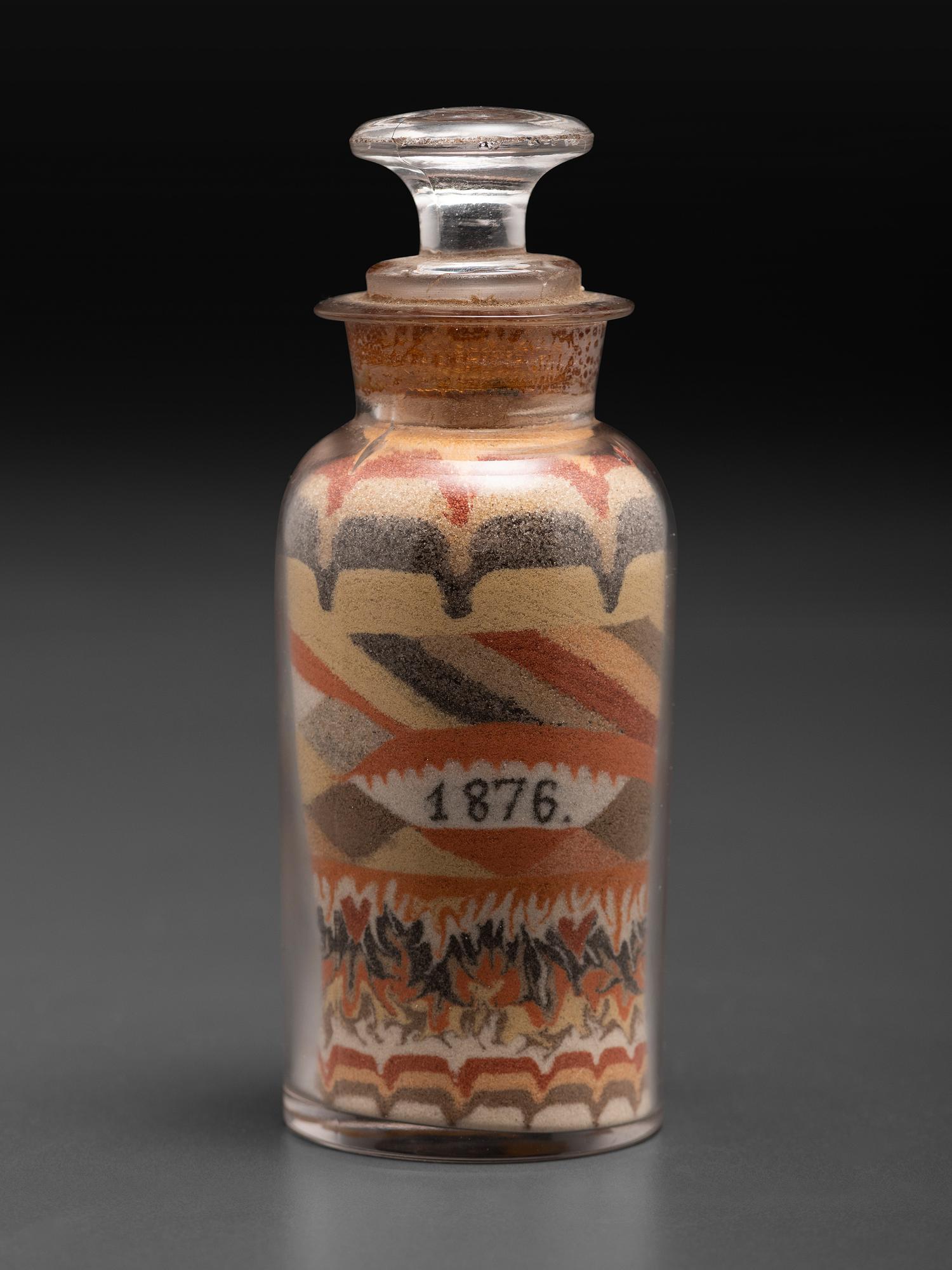 An Early Andrew Clemens (American, 1857-1894) Eagle Sand Bottle