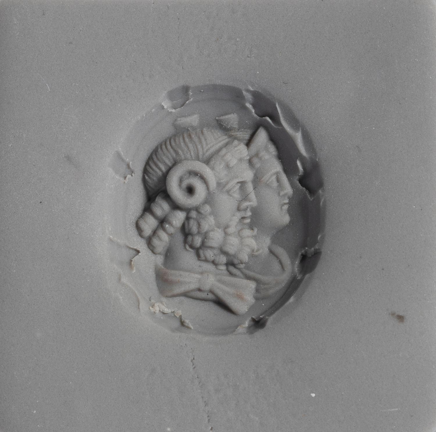 A Neoclassical Gold and Citrine Finger Ring with a Double Bust of Jupiter-Ammon and Juno-Isis