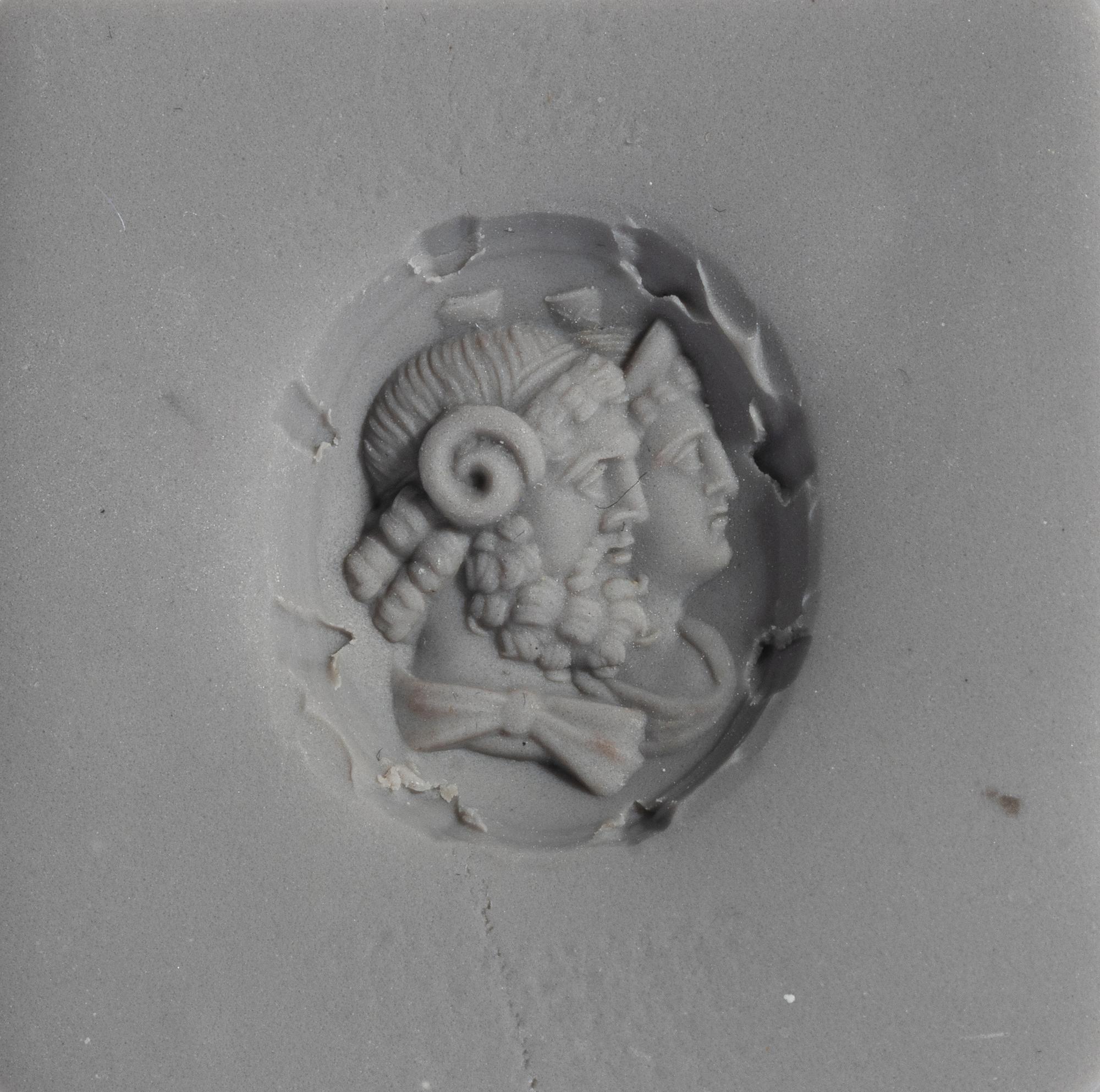 A Neoclassical Gold and Citrine Finger Ring with a Double Bust of Jupiter-Ammon and Juno-Isis
