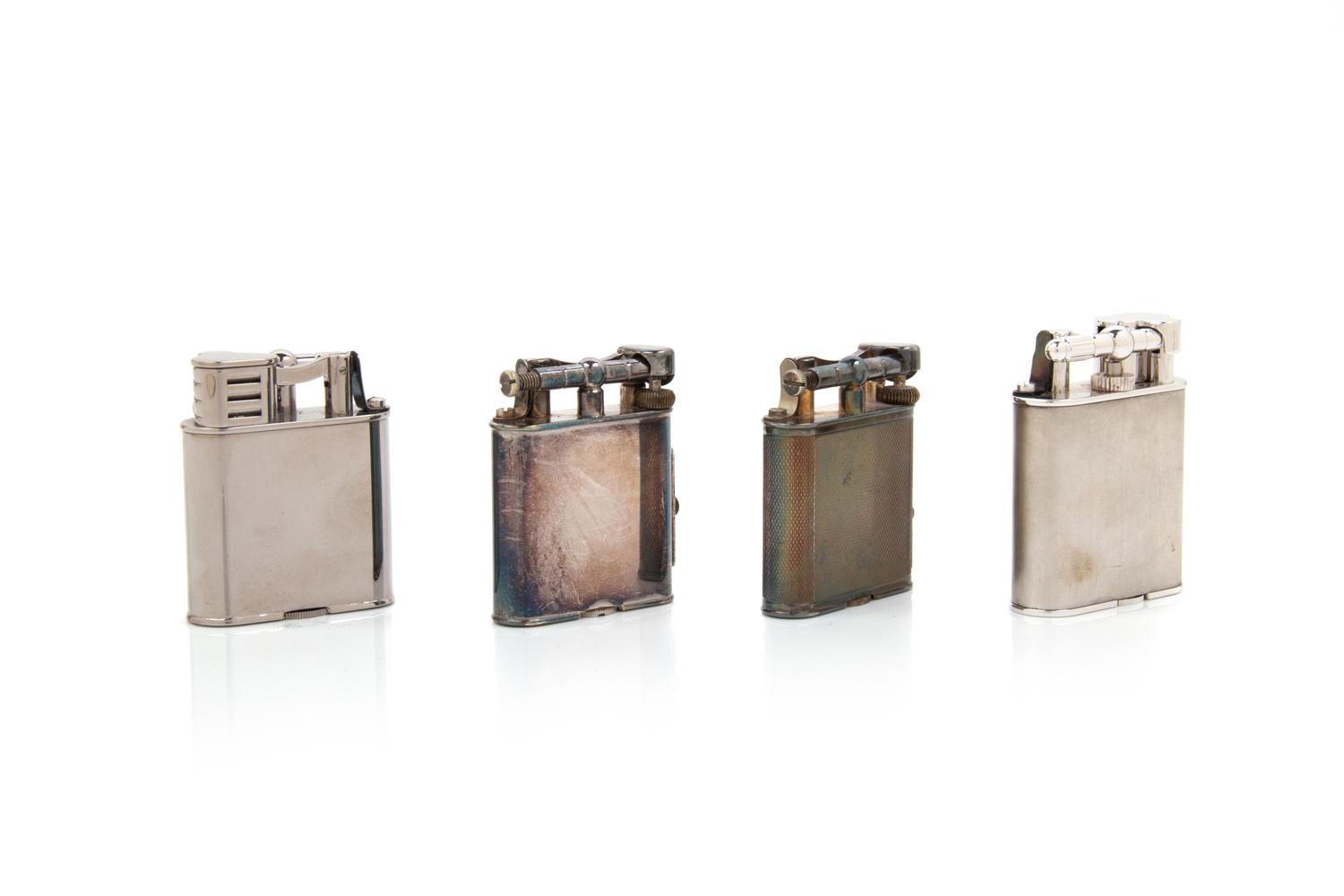Four Dunhill Lift-Arm Lighters