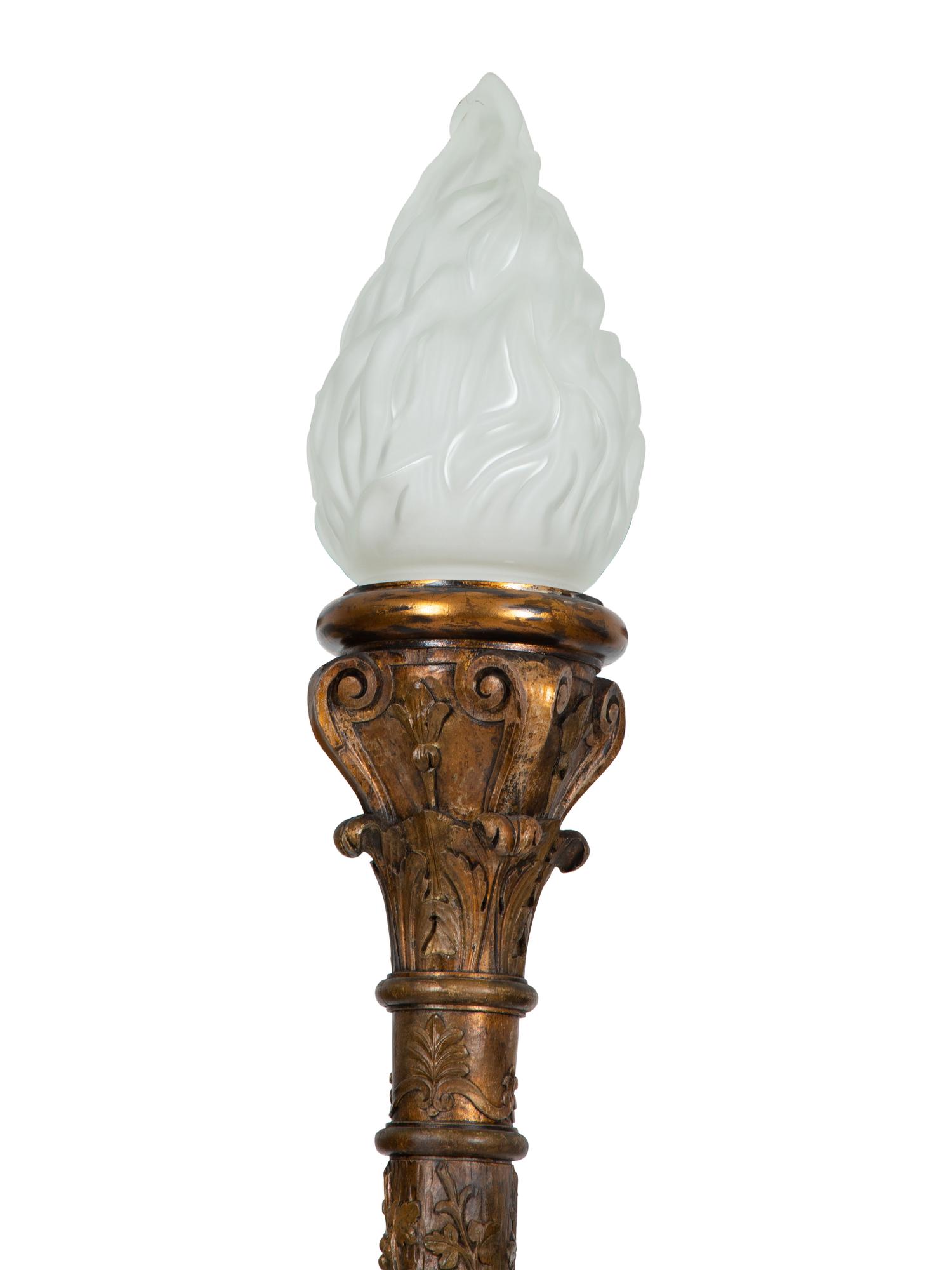 A Pair of Italian Baroque Style Giltwood Torchères with Frosted Glass Flame-Form Shades