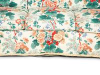 A Printed Cotton-Upholstered Three-Cushion Sofa, Club Chair and Ottoman