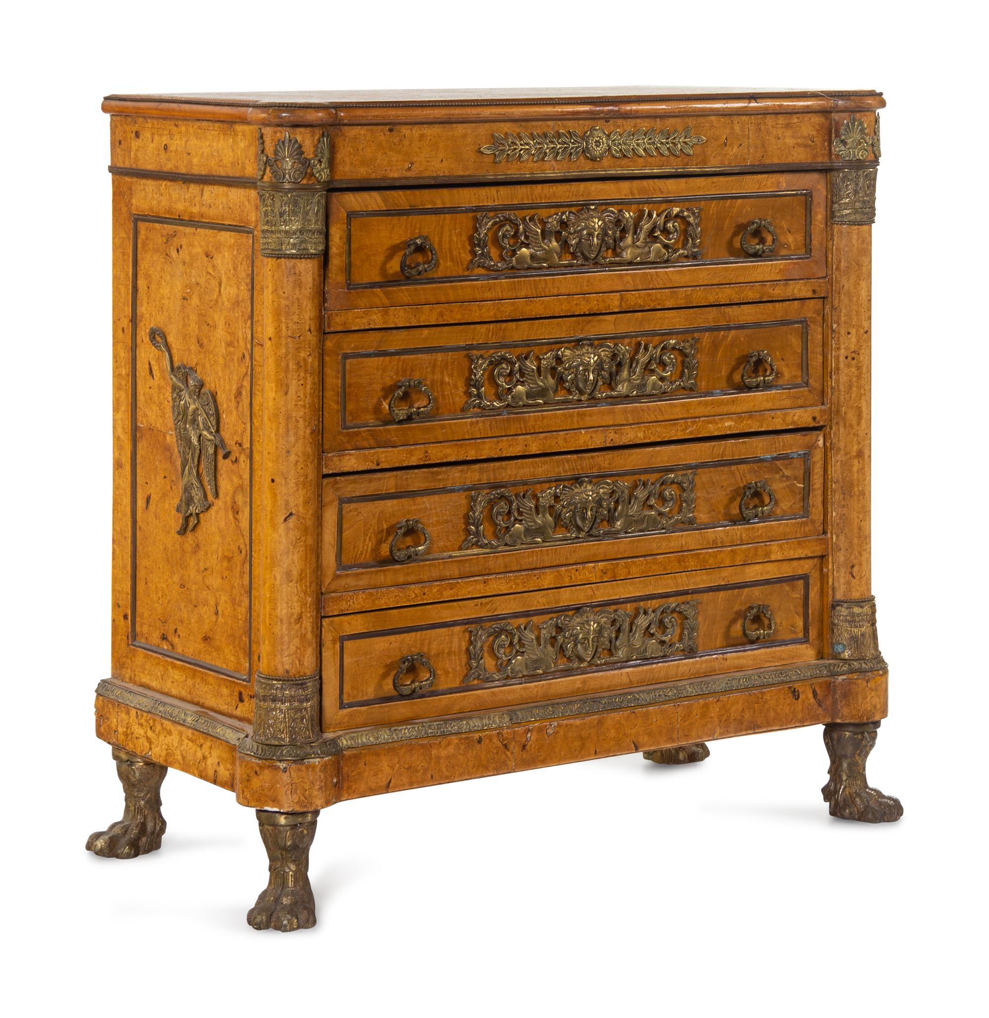 An Empire Style Gilt Metal Mounted Burlwood Chest of Drawers