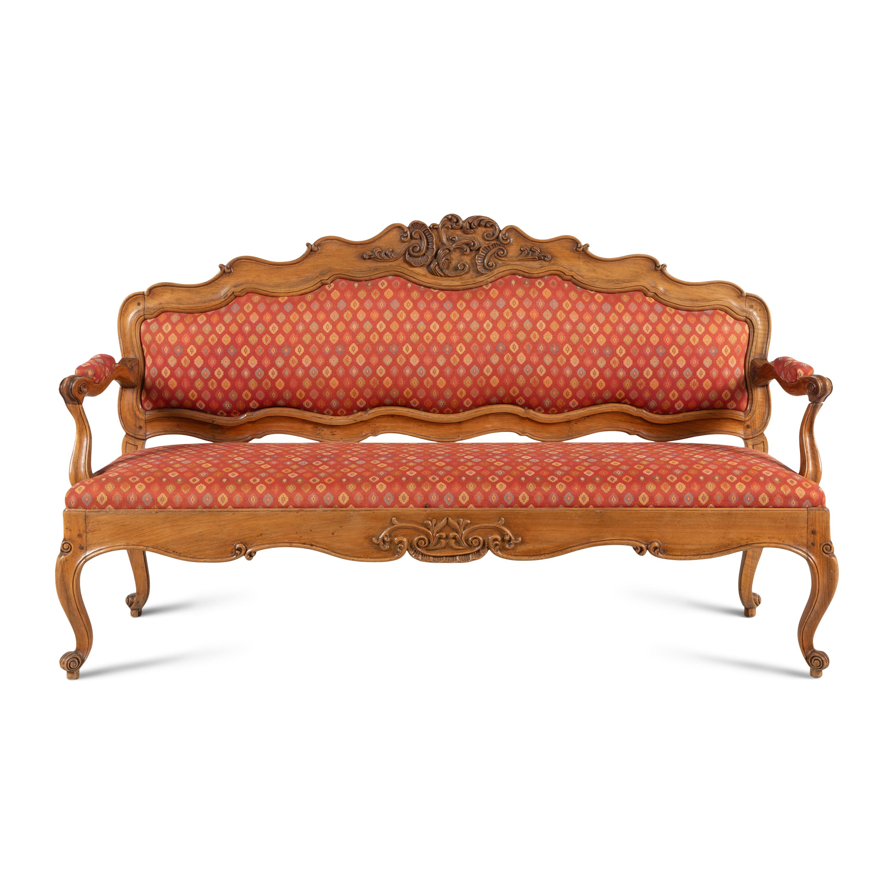 An Italian Carved Walnut Settee