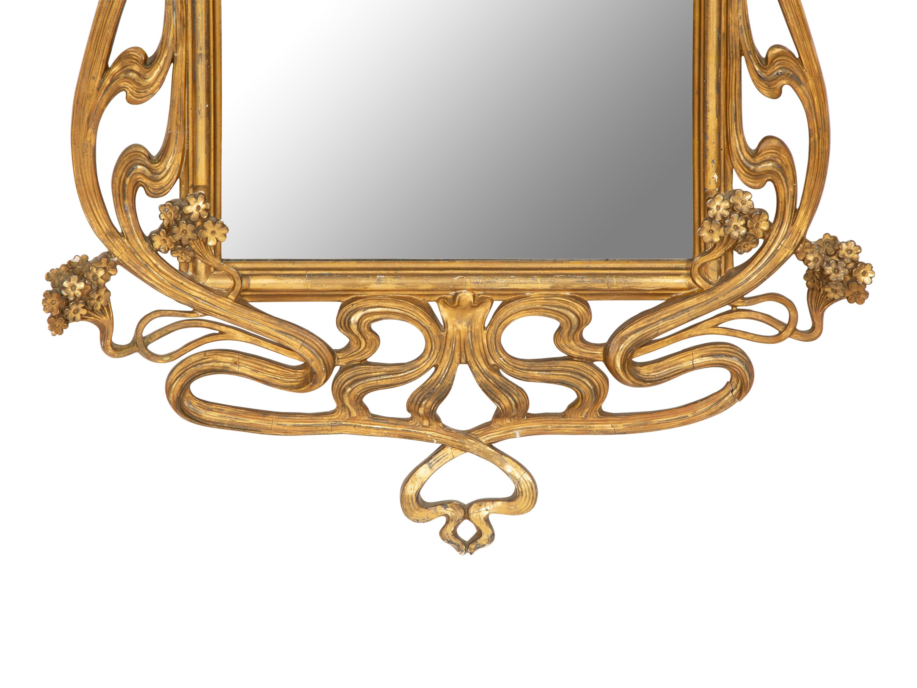 A Continental Art Nouveau Giltwood Mirror