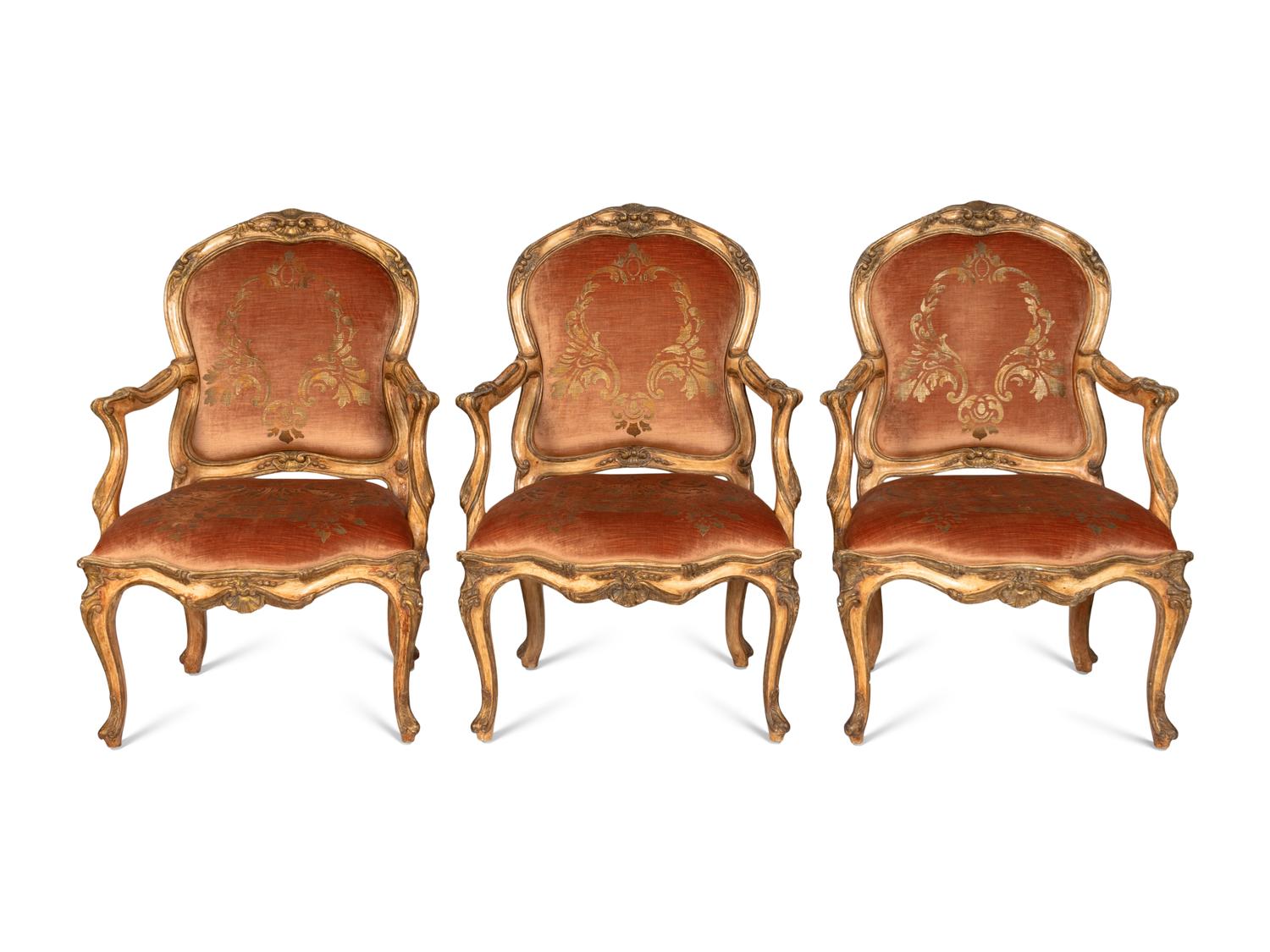 A Set of Twelve Louis XV Style Cream-Painted Fauteuils