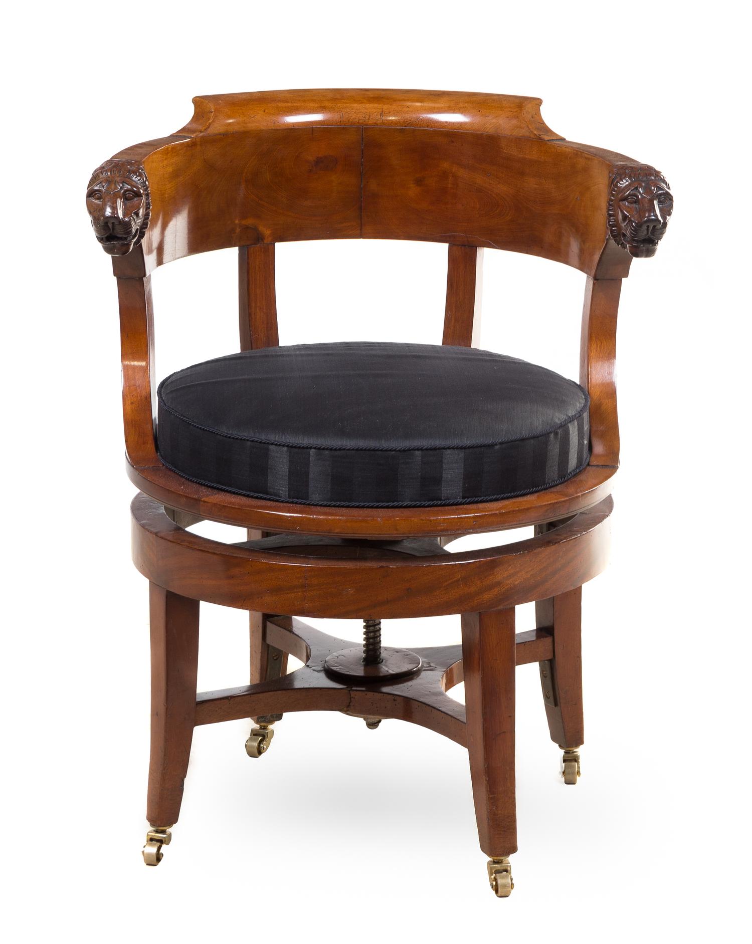 A German Mahogany Armchair Height 32 3/4 inches. — 19TH CENTURY