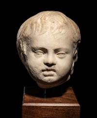 A Roman Marble Portrait Head of Eros
