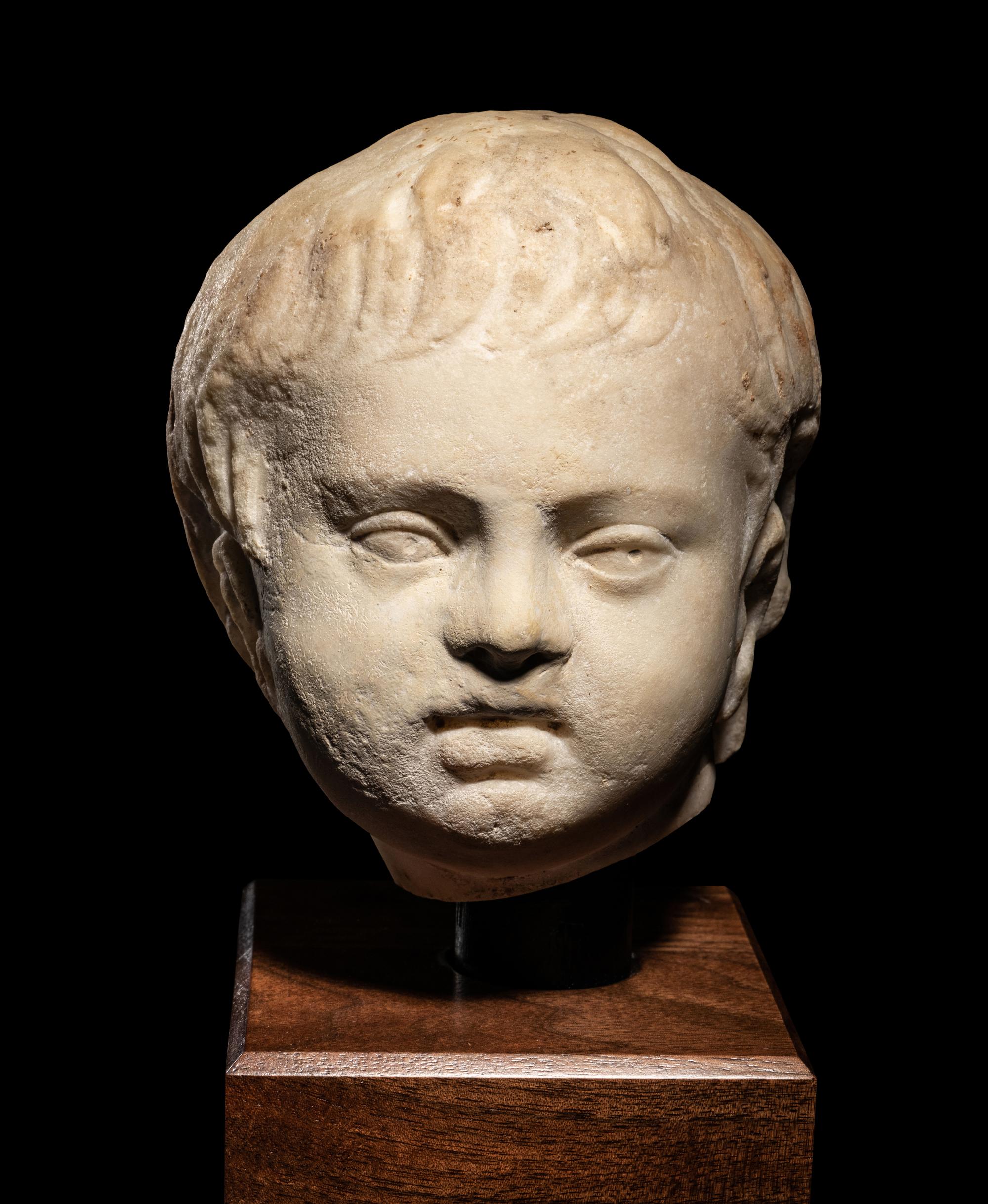 A Roman Marble Portrait Head of Eros