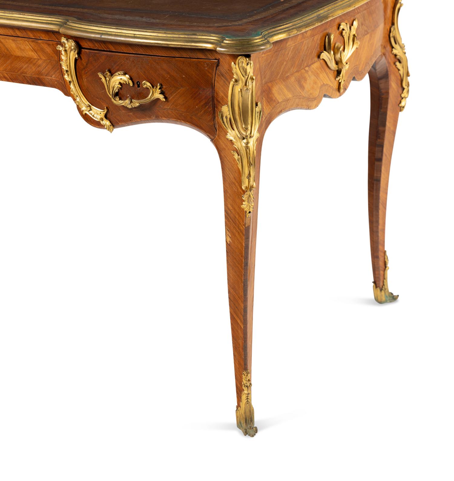 A Louis XV Style Gilt Bronze Mounted Parquetry Bureau Plat