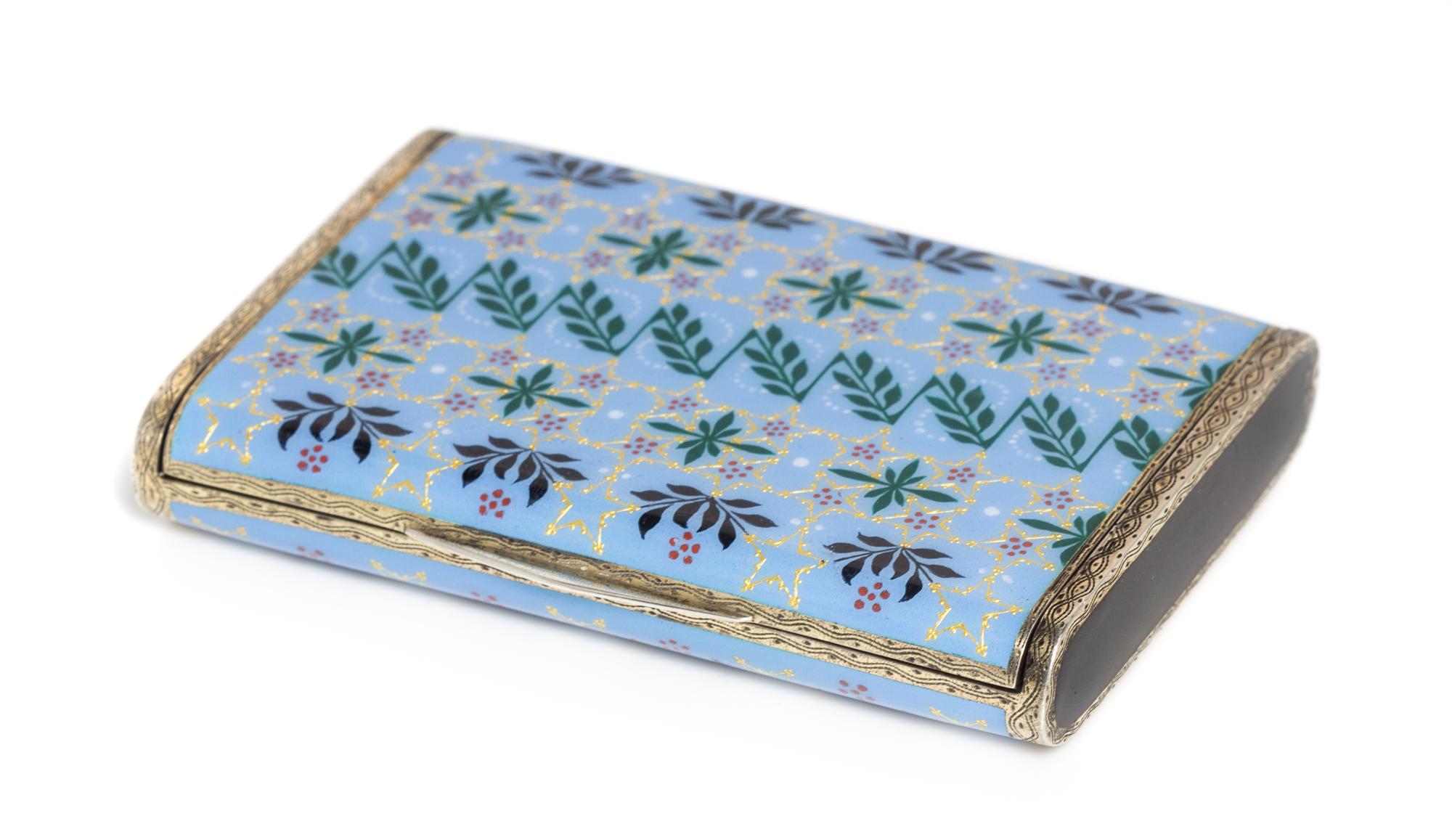 A Continental Silver and Enamel Cigarette Case, Maker's Mark Obscured, the case having a light-blue enamel ground with repeating bands
