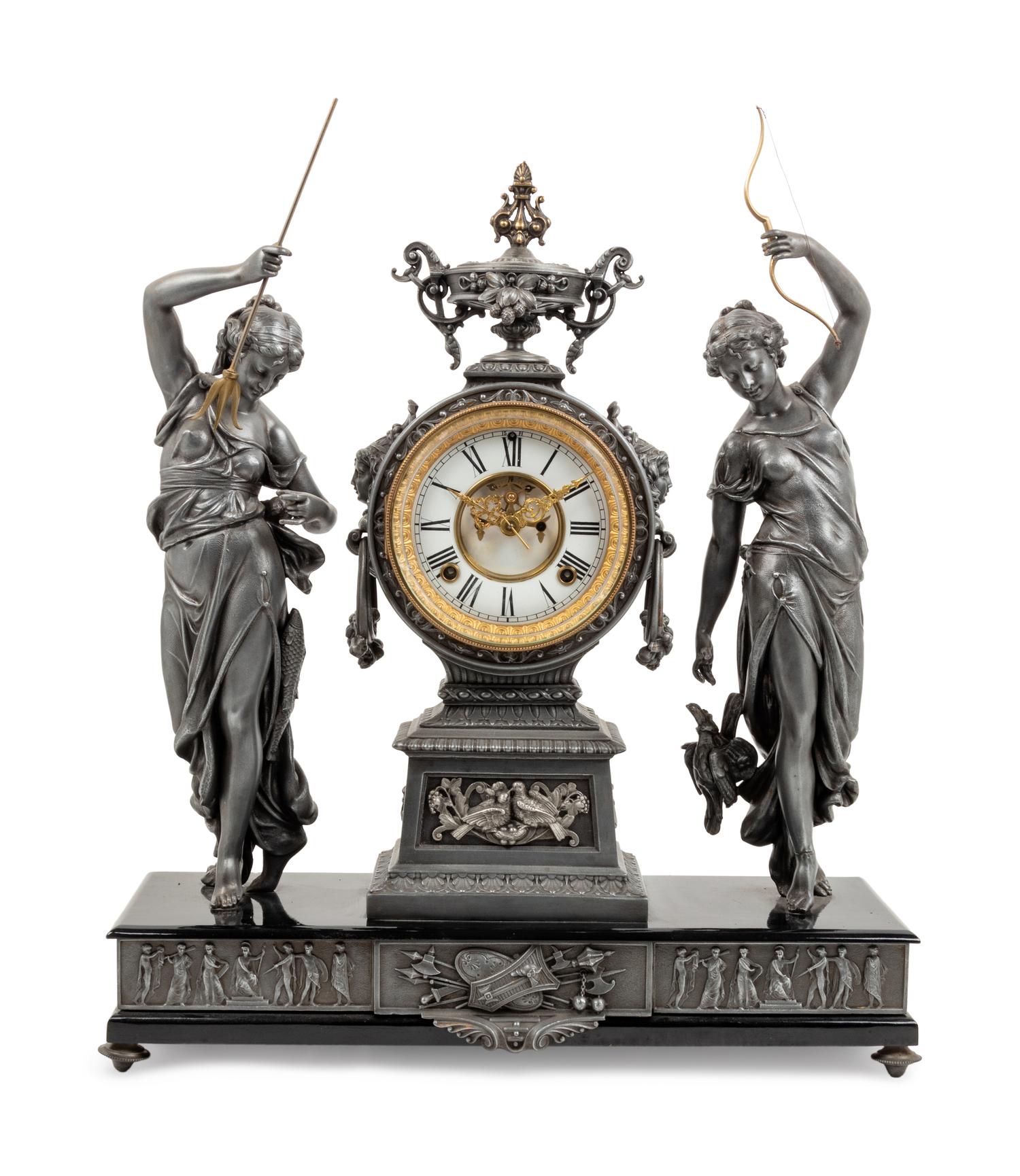 An Ansonia Fisher & Hunter Silvered Metal Mantel Clock