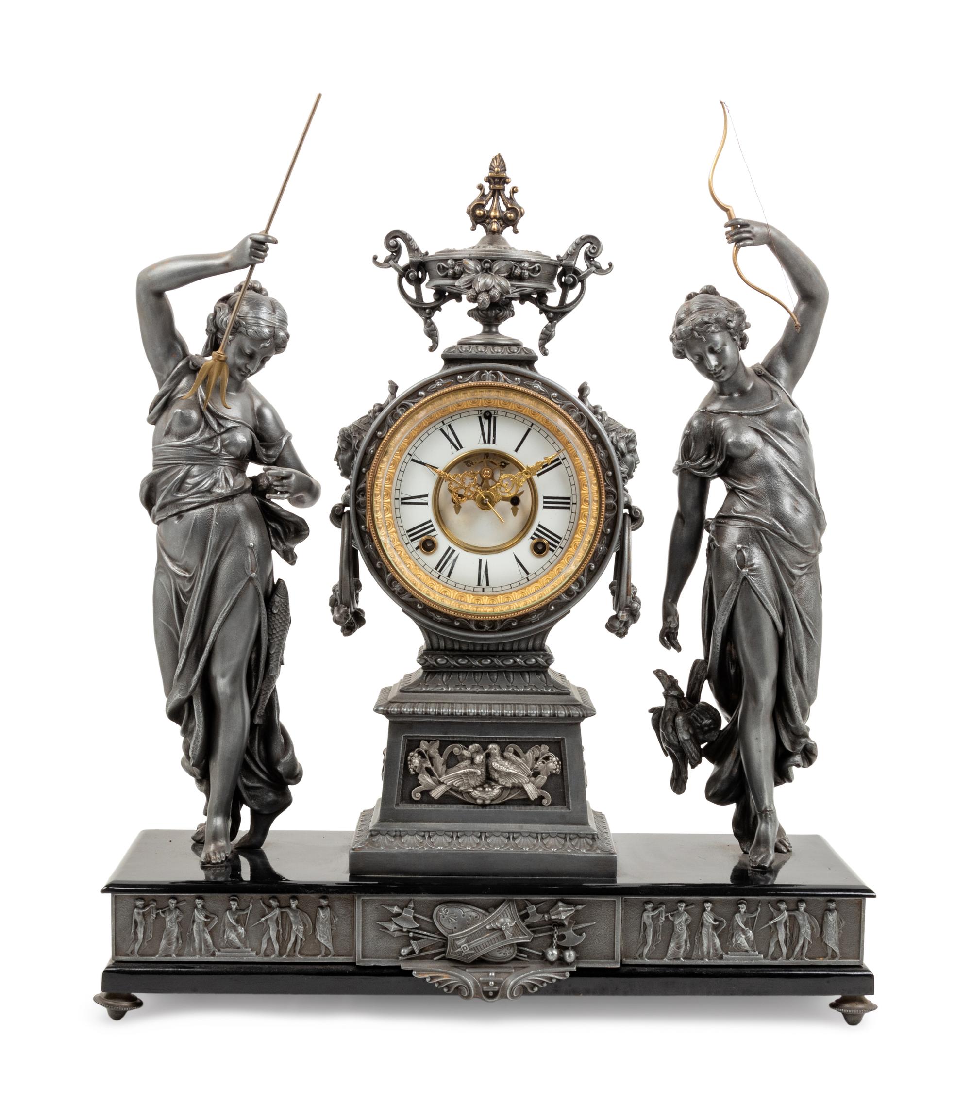 An Ansonia Fisher & Hunter Silvered Metal Mantel Clock