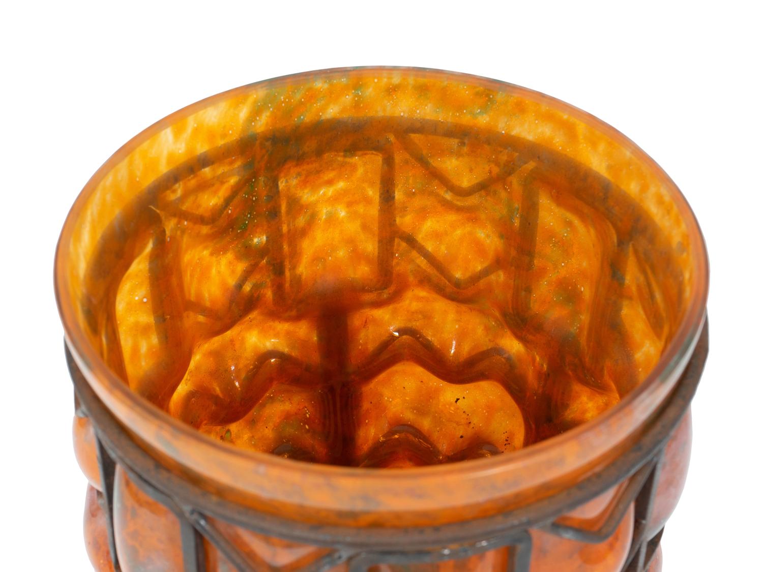 An Unsigned Daum Wrought-Iron and Glass Blow-Out Vase — CIRCA 1930