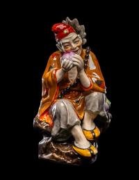A Chinese Famille Rose Porcelain Figure of Jigong