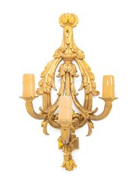 A Set of Four Louis XVI Style Gilt Metal Three-Light Sconces