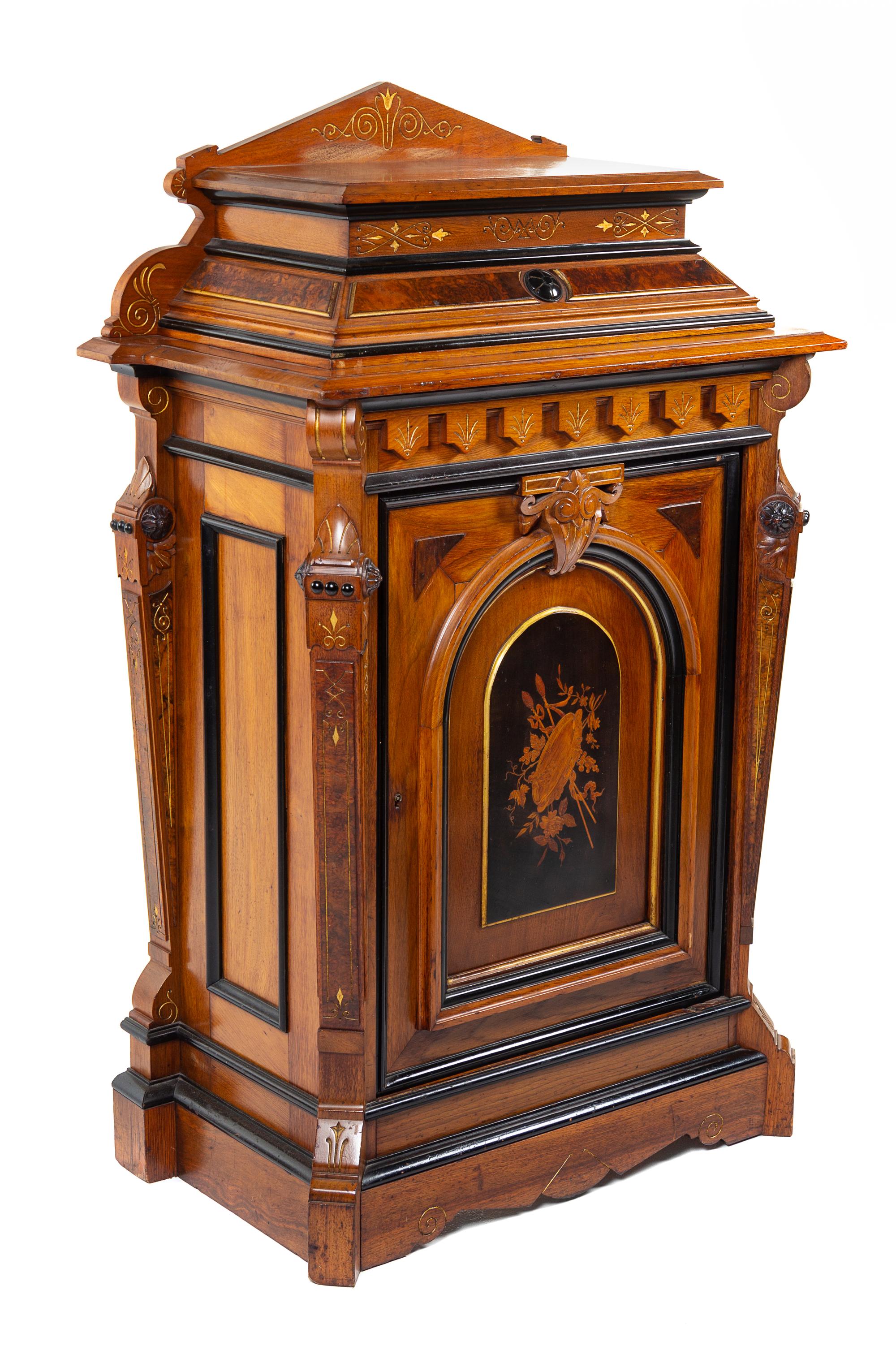 A Victorian Parcel Ebonized Marquetry Cabinet Height 54 x width 35 x depth 18 inches. — MANNER OF HERTER BROS., NEW YORK, LATE 19TH CENTURY