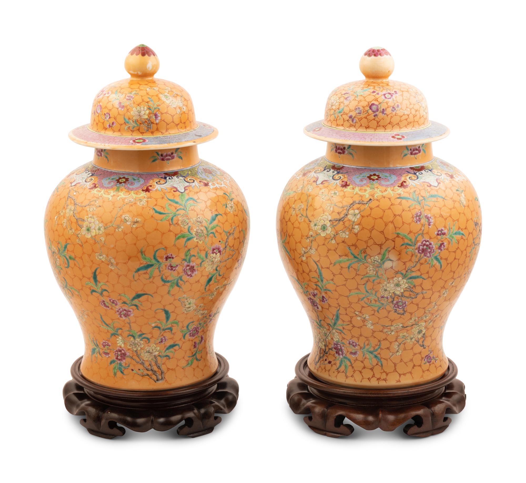 A Pair of Chinese Ochre Ground Famille Rose Porcelain Covered Jars