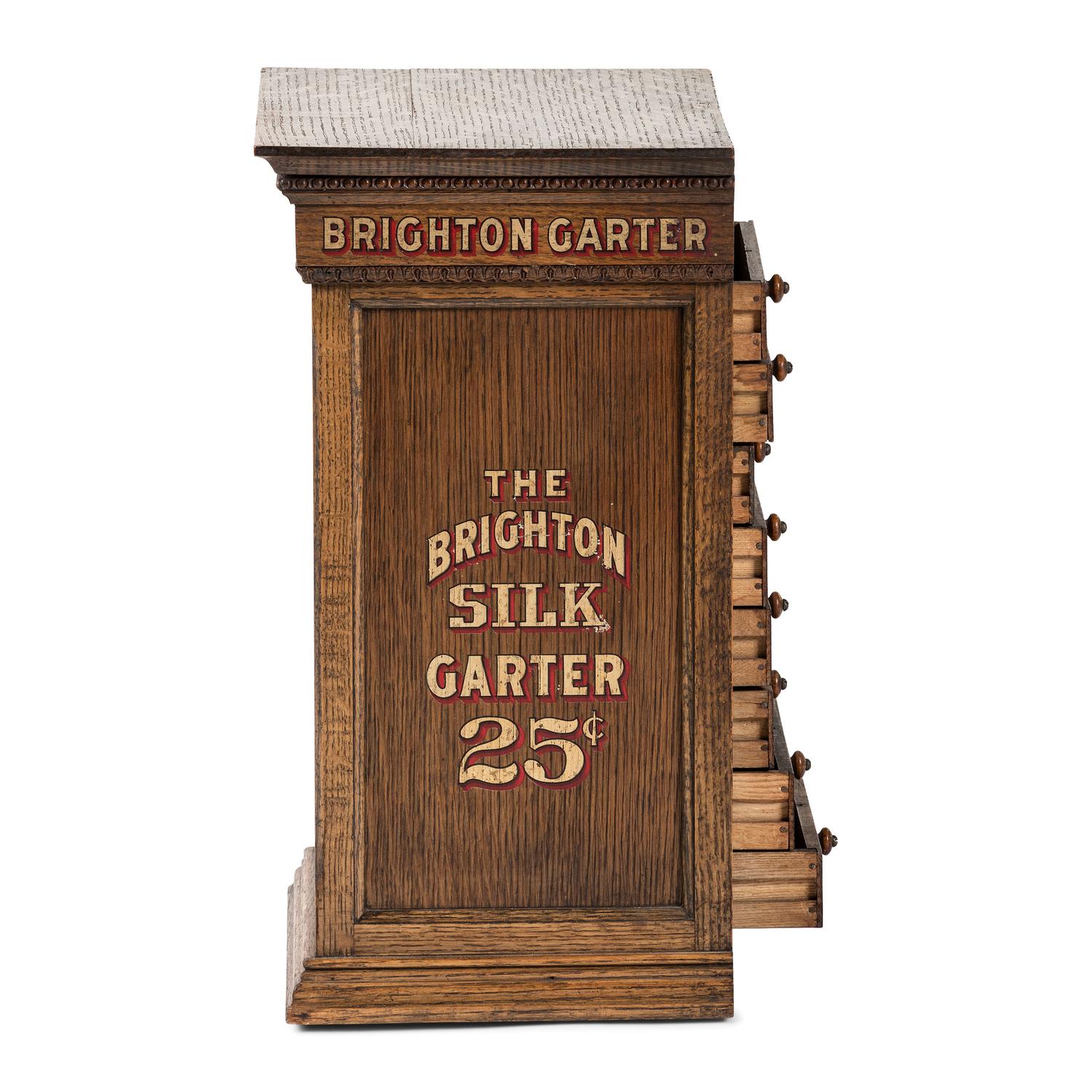 A Brighton Silk Garter Advertising Store Display Case