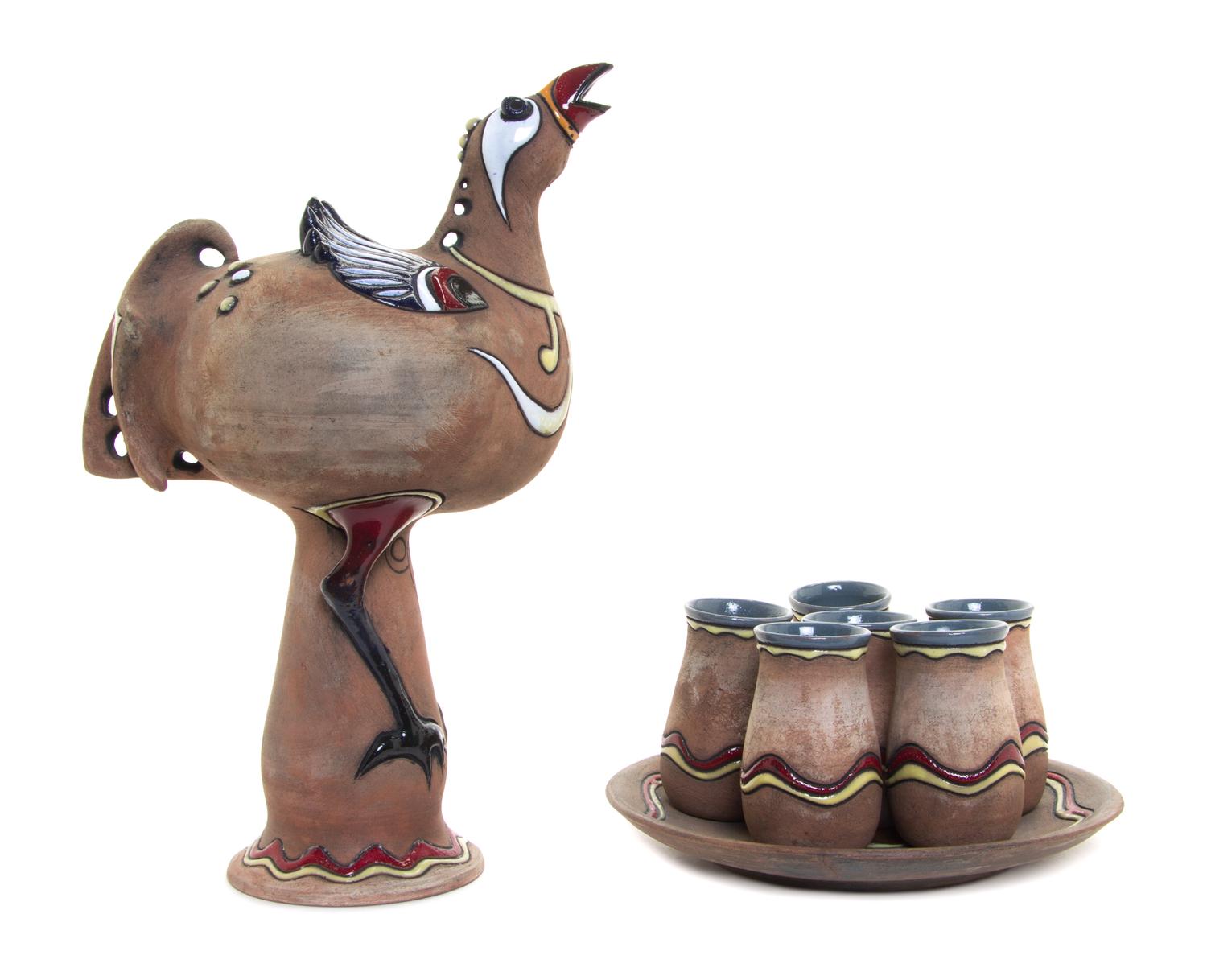 A Studio Ceramic Drink Service Height of pitcher 12 1/2 inches.
