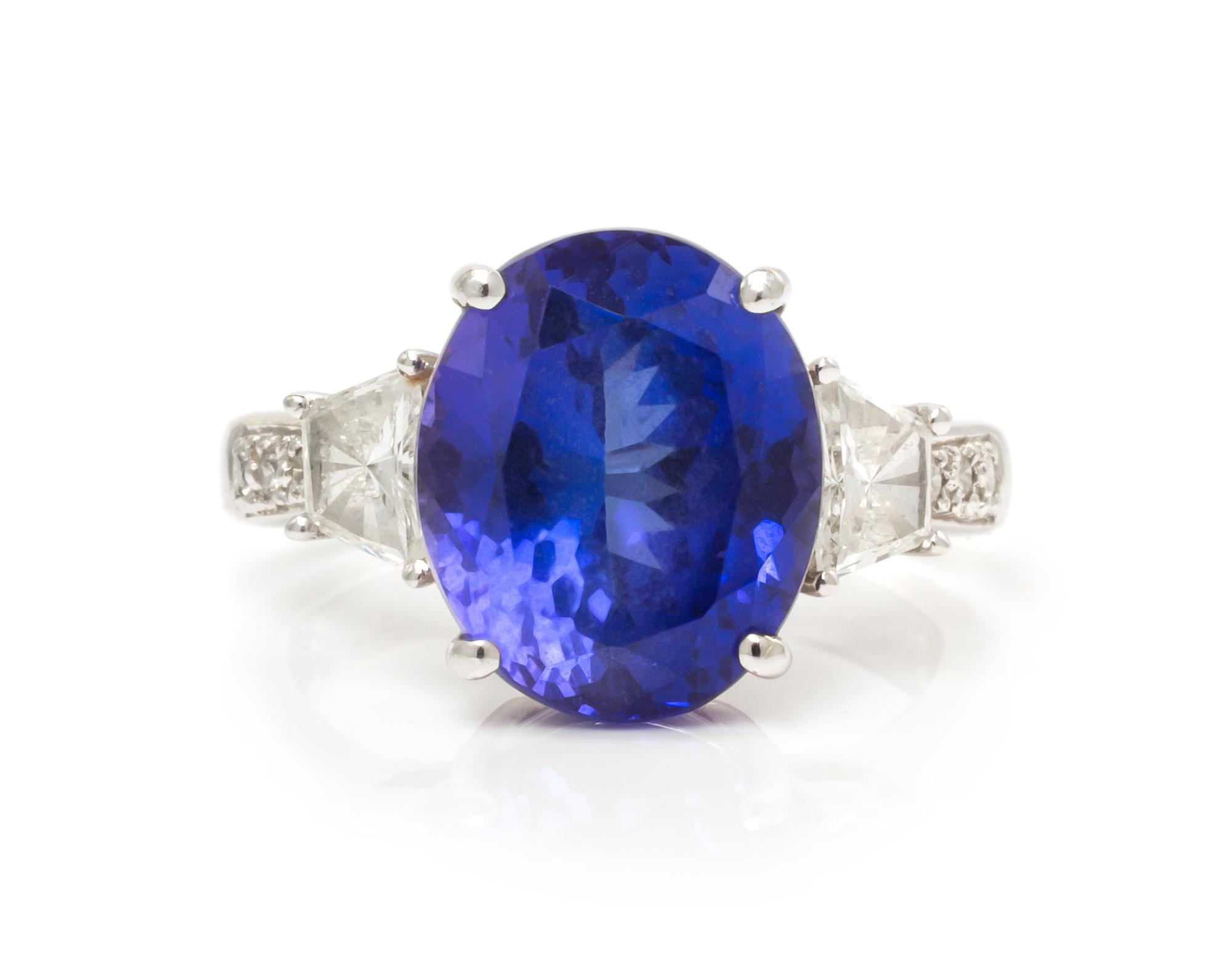 An 18 Karat White Gold, Tanzanite and Diamond Ring, 4.30 dwts.