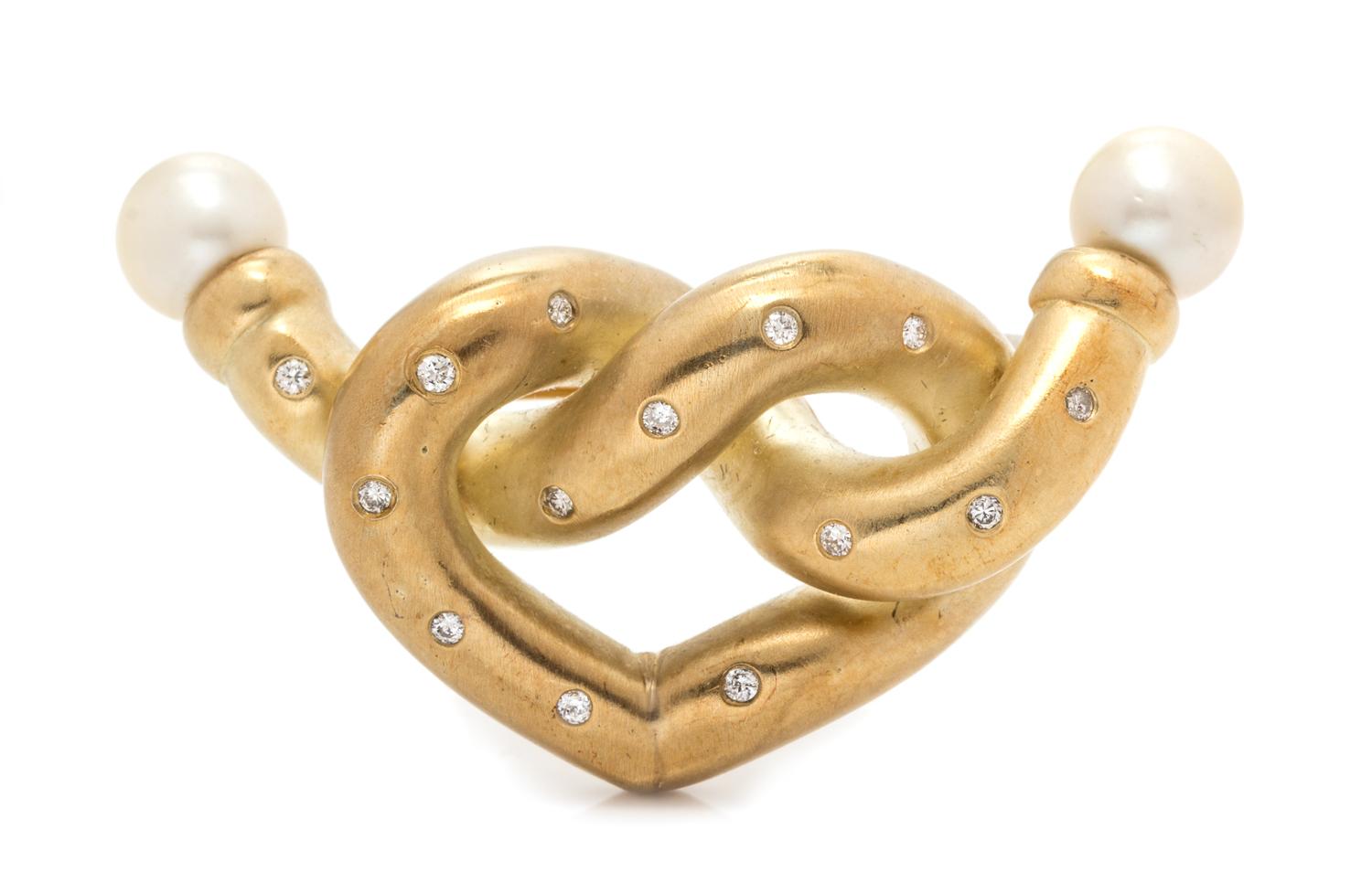 A Yellow Gold, Diamond and Cultured Pearl Knot Motif Brooch, 12.00 dwts.