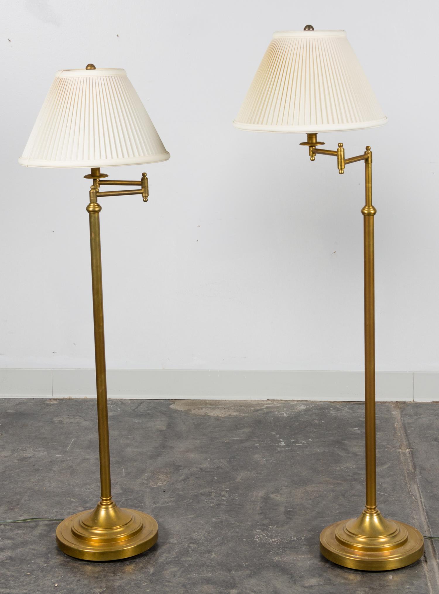 A Pair of Brass Floor Lamps Height of tallest 50 3/4 inches (overall).