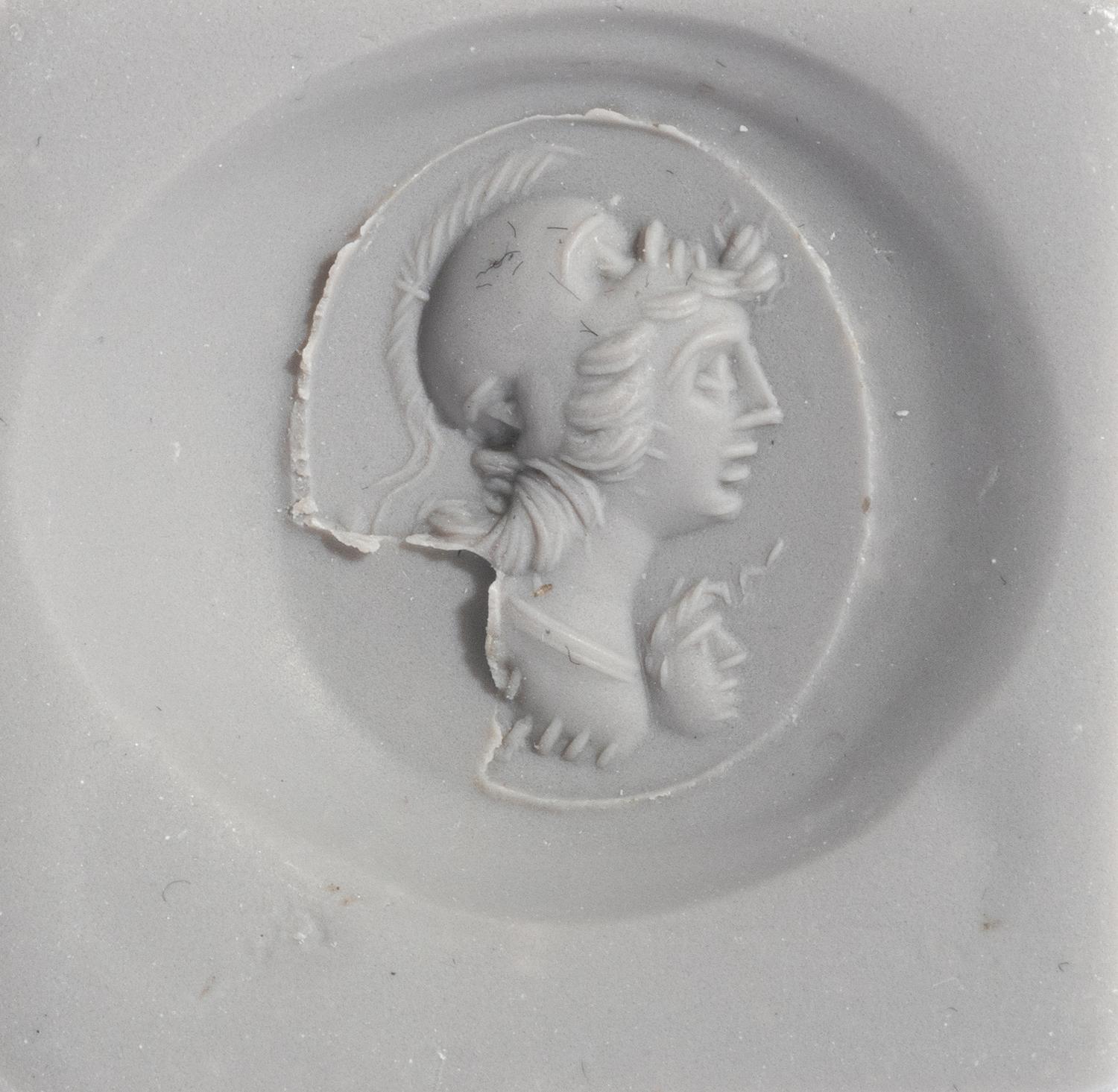A Roman Carnelian Ring Stone with a Gryllos (Composite Figure) — Set in a solid gold ring