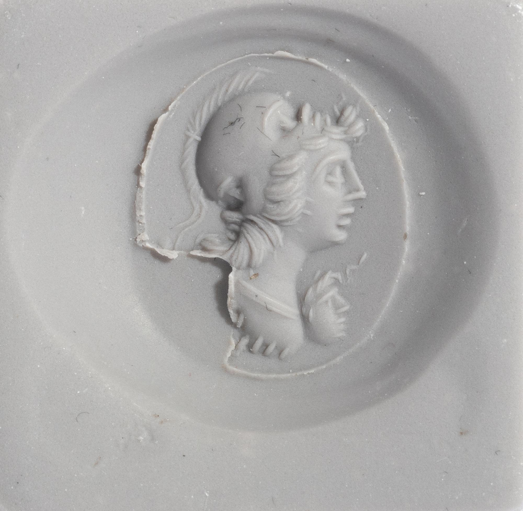 A Roman Carnelian Ring Stone with a Gryllos (Composite Figure) — Set in a solid gold ring