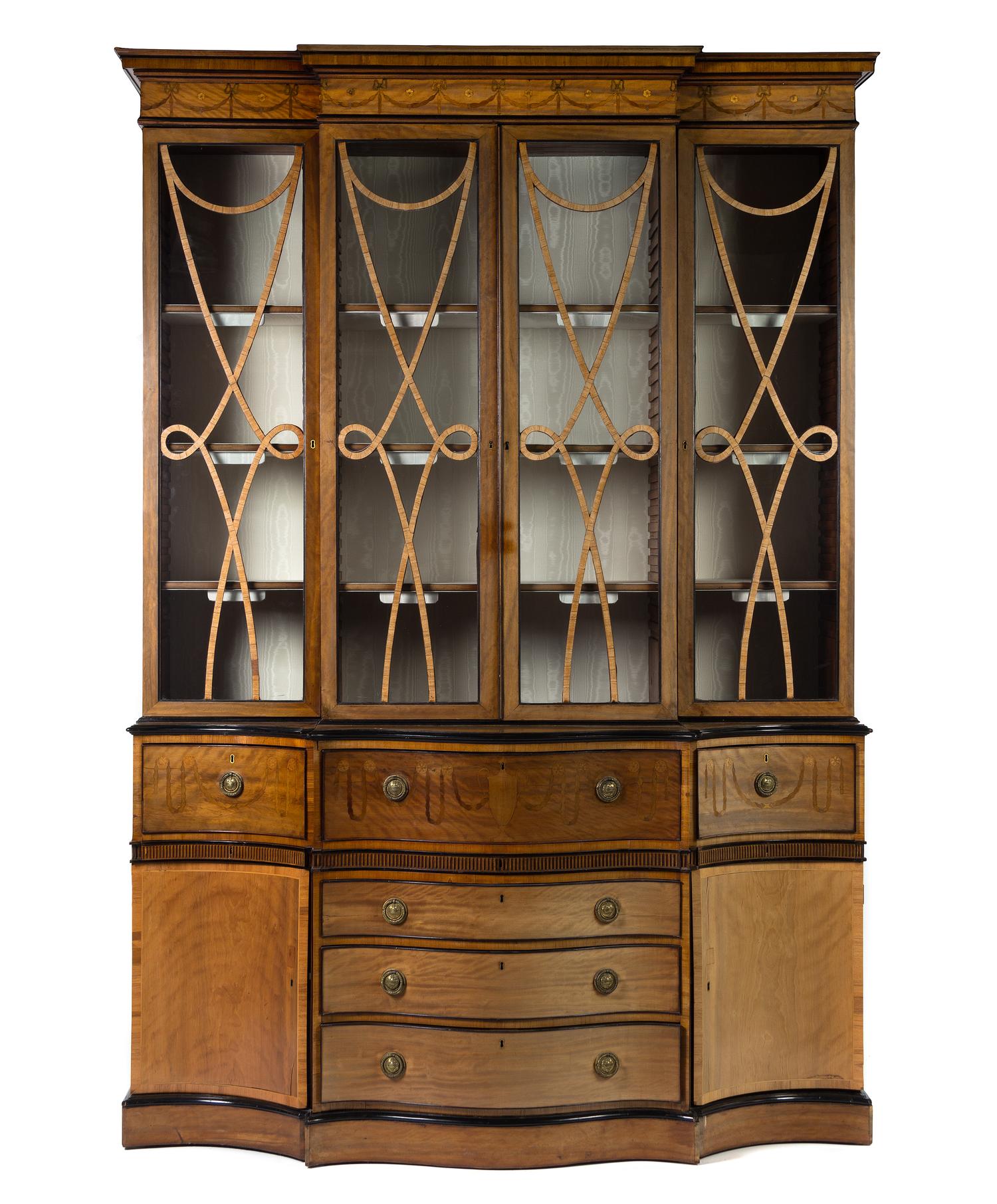 An Edwardian Parcel Ebonized Satinwood and Marquetry Breakfront Bookcase Height 101 1/2 x width 69 x depth 25 inches. — EARLY 20TH CENTURY WITH ALTERATION