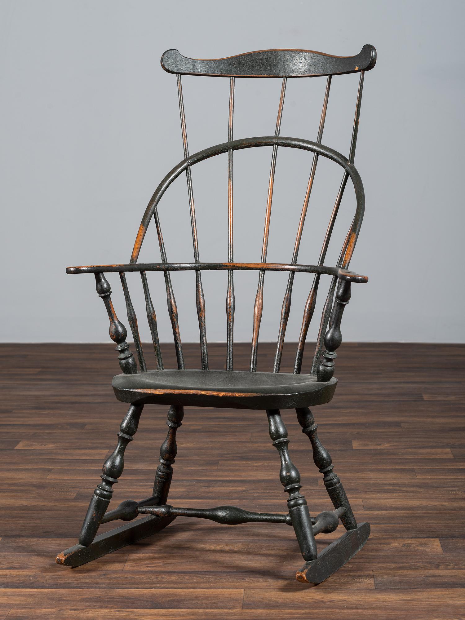 A Green-Painted Sack and Comb-Back Windsor Rocker