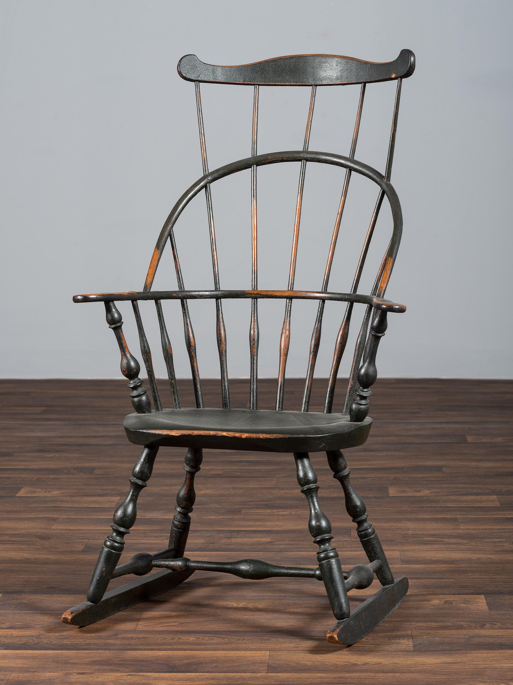 A Green-Painted Sack and Comb-Back Windsor Rocker
