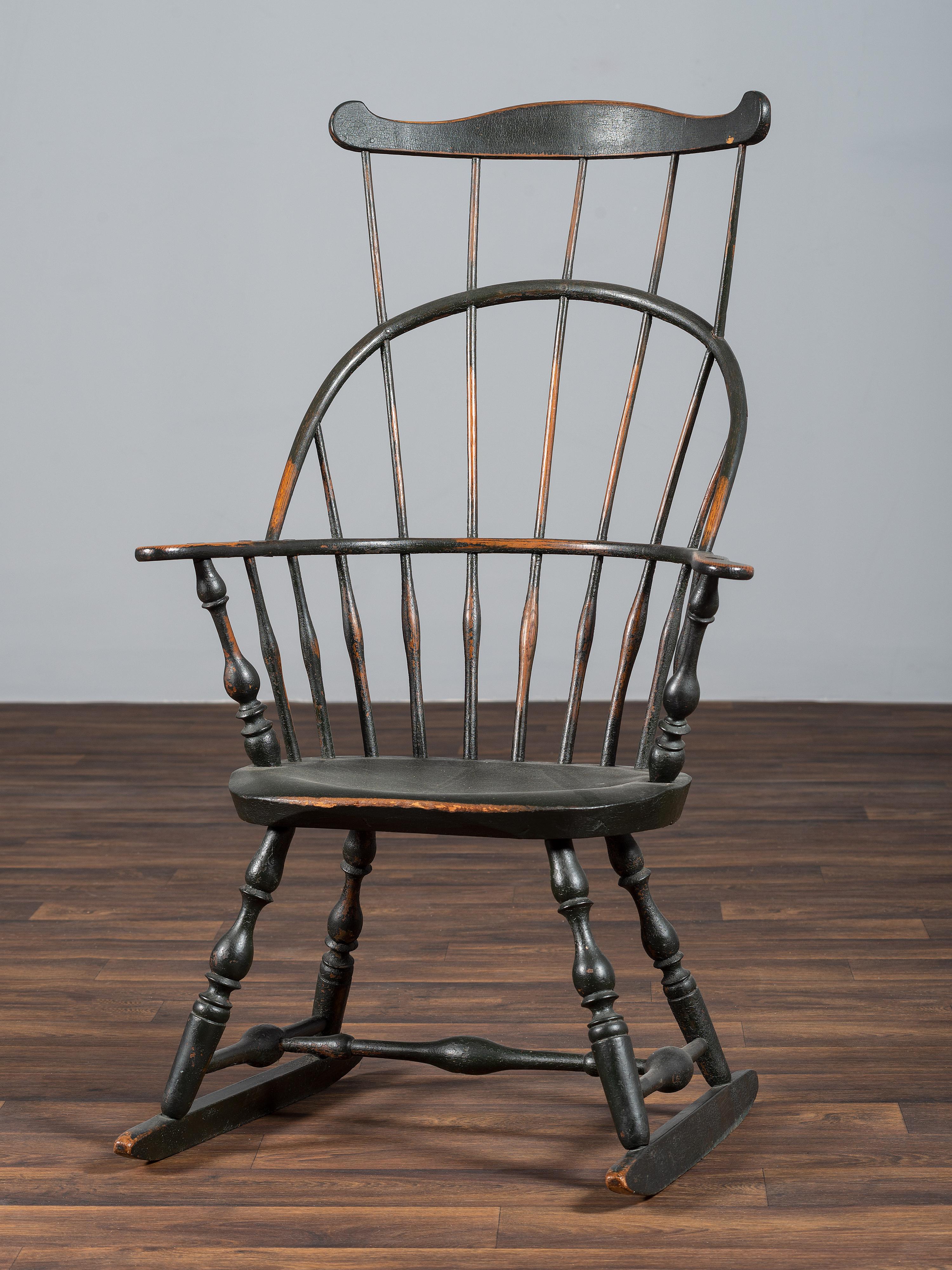 A Green-Painted Sack and Comb-Back Windsor Rocker