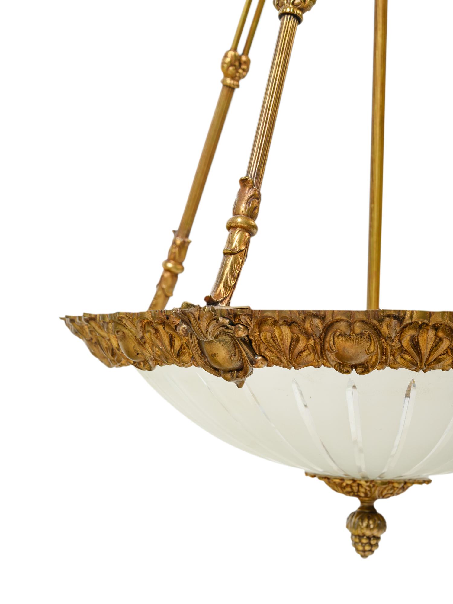A Neoclassical Style Gilt Metal and Frosted Glass Hanging Fixture