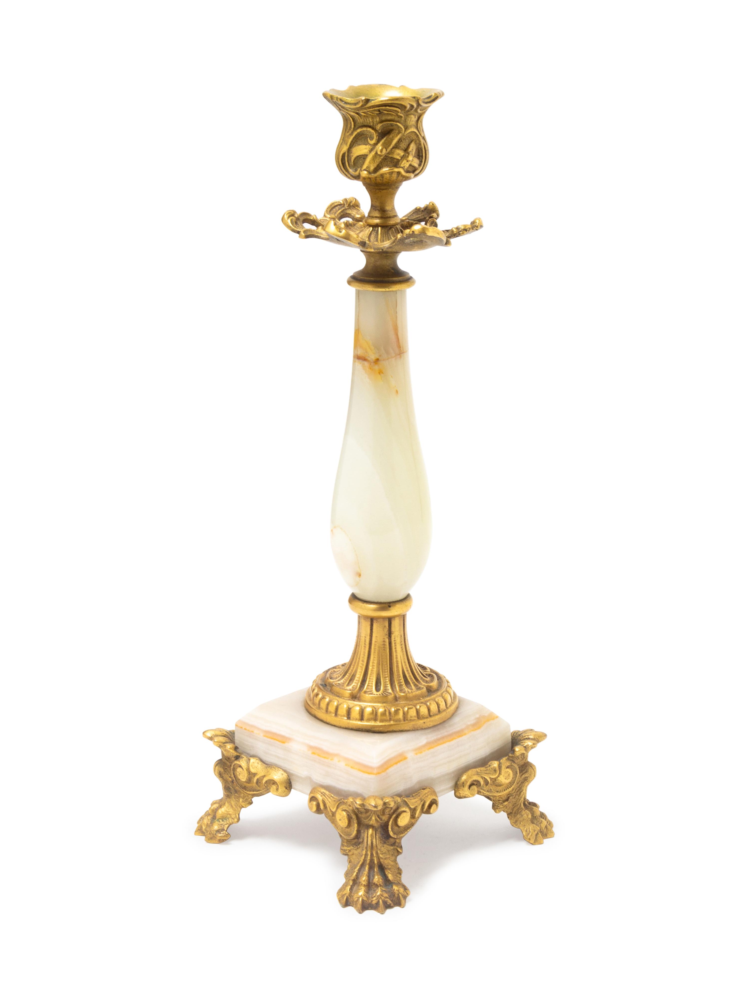A French Gilt Metal and Onyx Candlestick