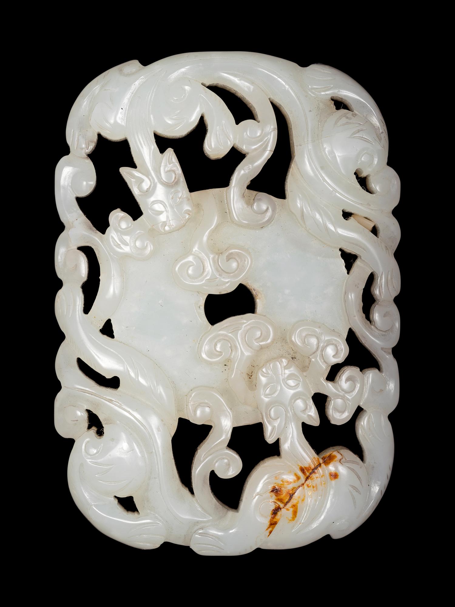 Five Chinese Carved Celadon Jade Pendants