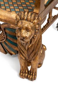 A Pair of Egyptian Revival Style Parcel-Gilt and Polychromed Throne Chairs