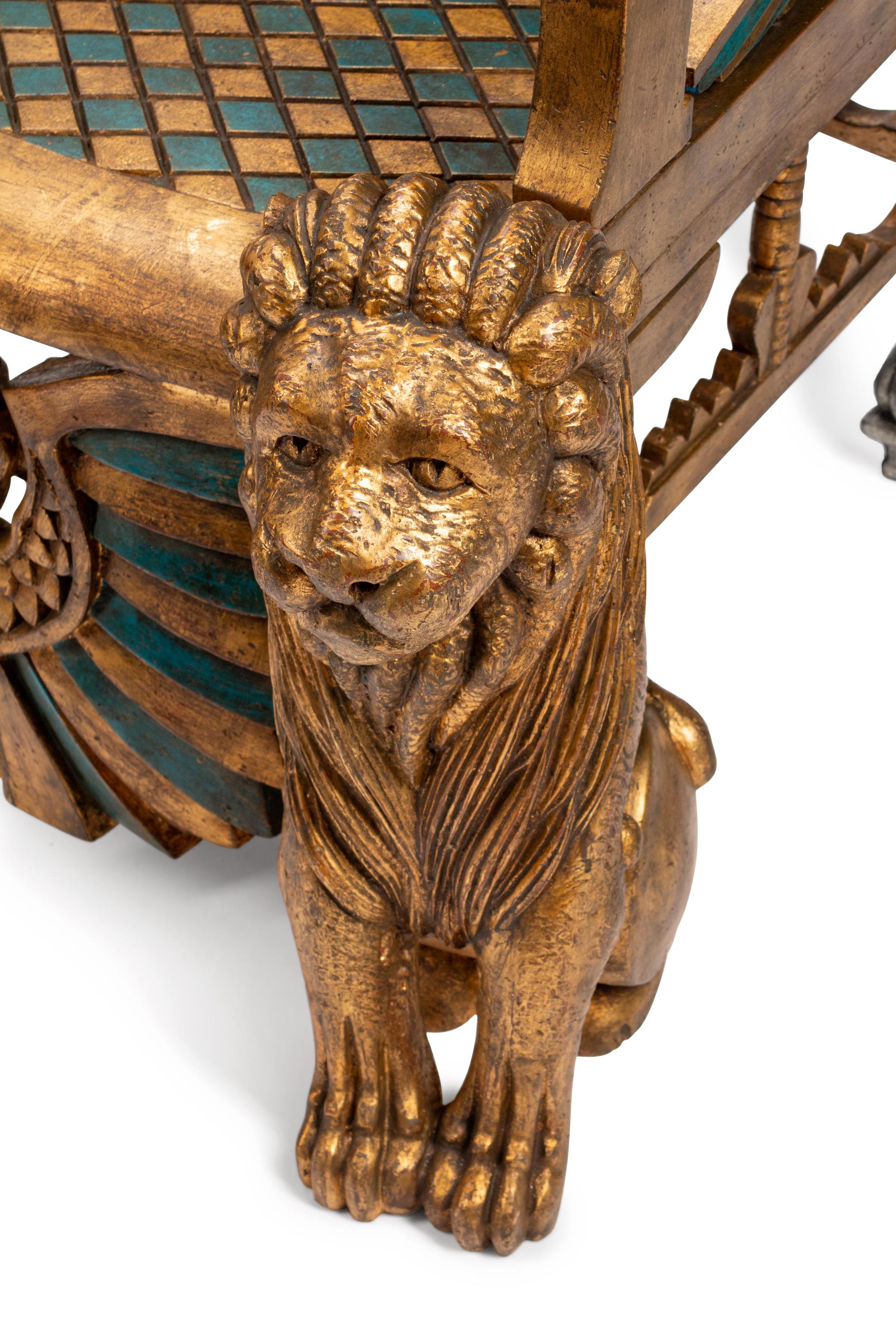 A Pair of Egyptian Revival Style Parcel-Gilt and Polychromed Throne Chairs